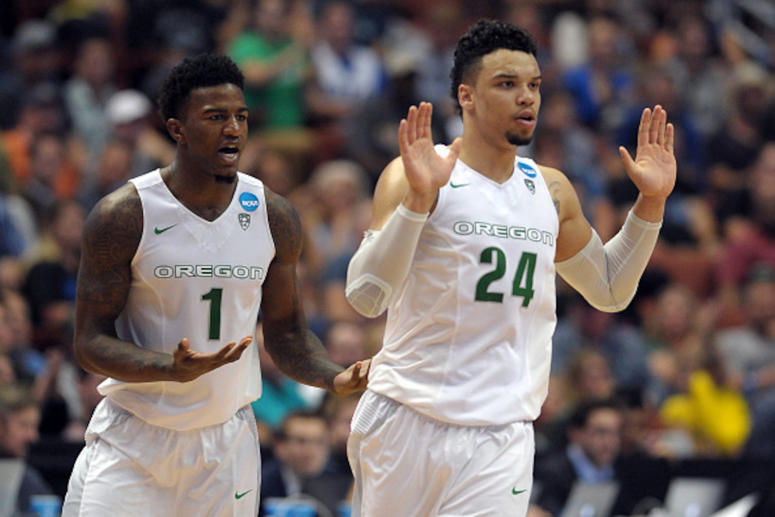 ANAHEIM, CA - MARCH 24: Jordan Bell #1 and Dillon Brooks #24 of the Oregon Ducks react against the Duke Blue Devils during the West Regional Semifinal of the 2016 NCAA Men's Basketball Tournament at Honda Center on March 24, 2016 in Anaheim, California. (