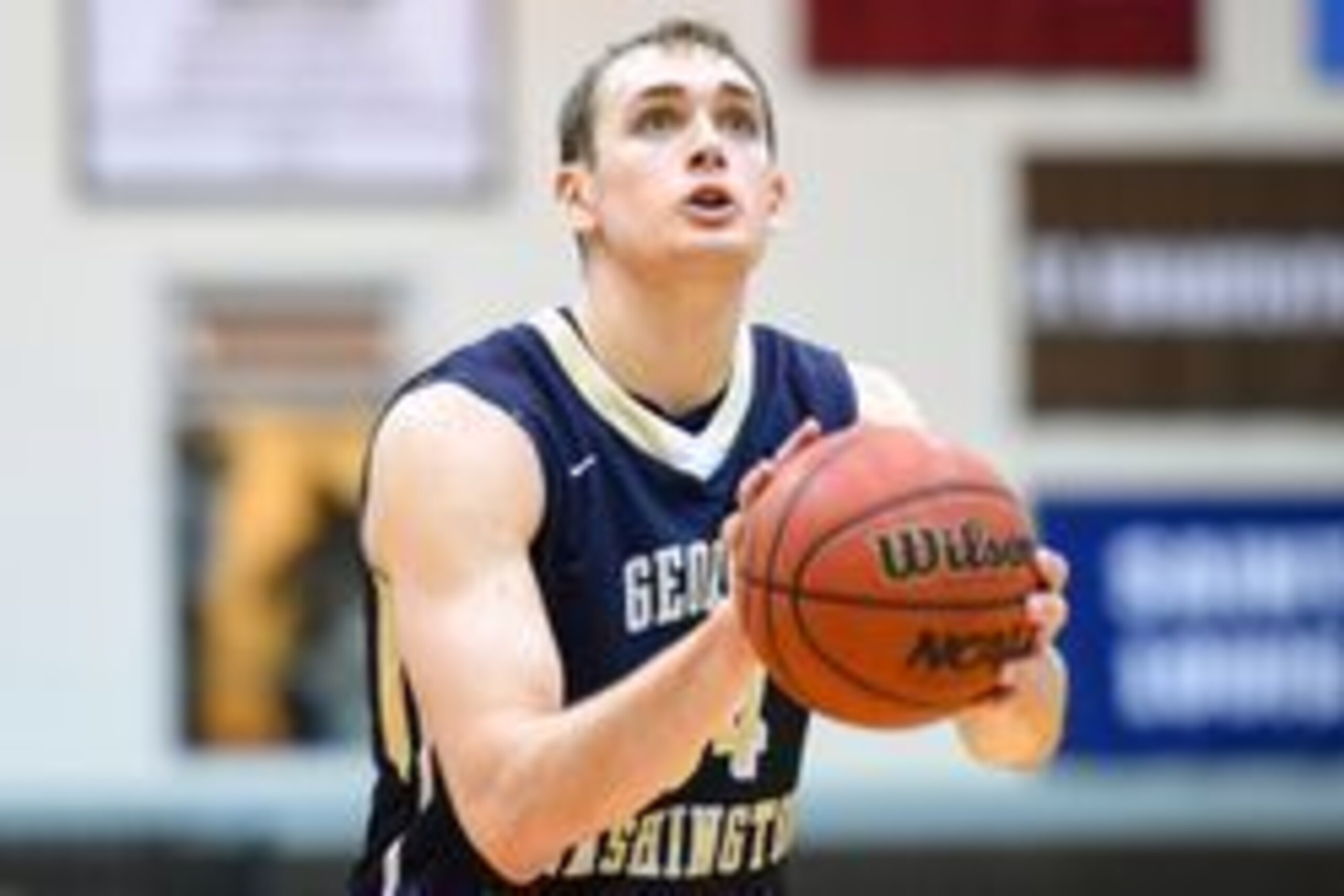 Feb 13, 2016; St. Bonaventure, NY, USA; George Washington Colonials forward Tyler Cavanaugh (34) shoots a free throw against the St. Bonaventure Bonnies during the second half at the Reilly Center.  St. Bonaventure defeated George Washington 64-57.  Manda