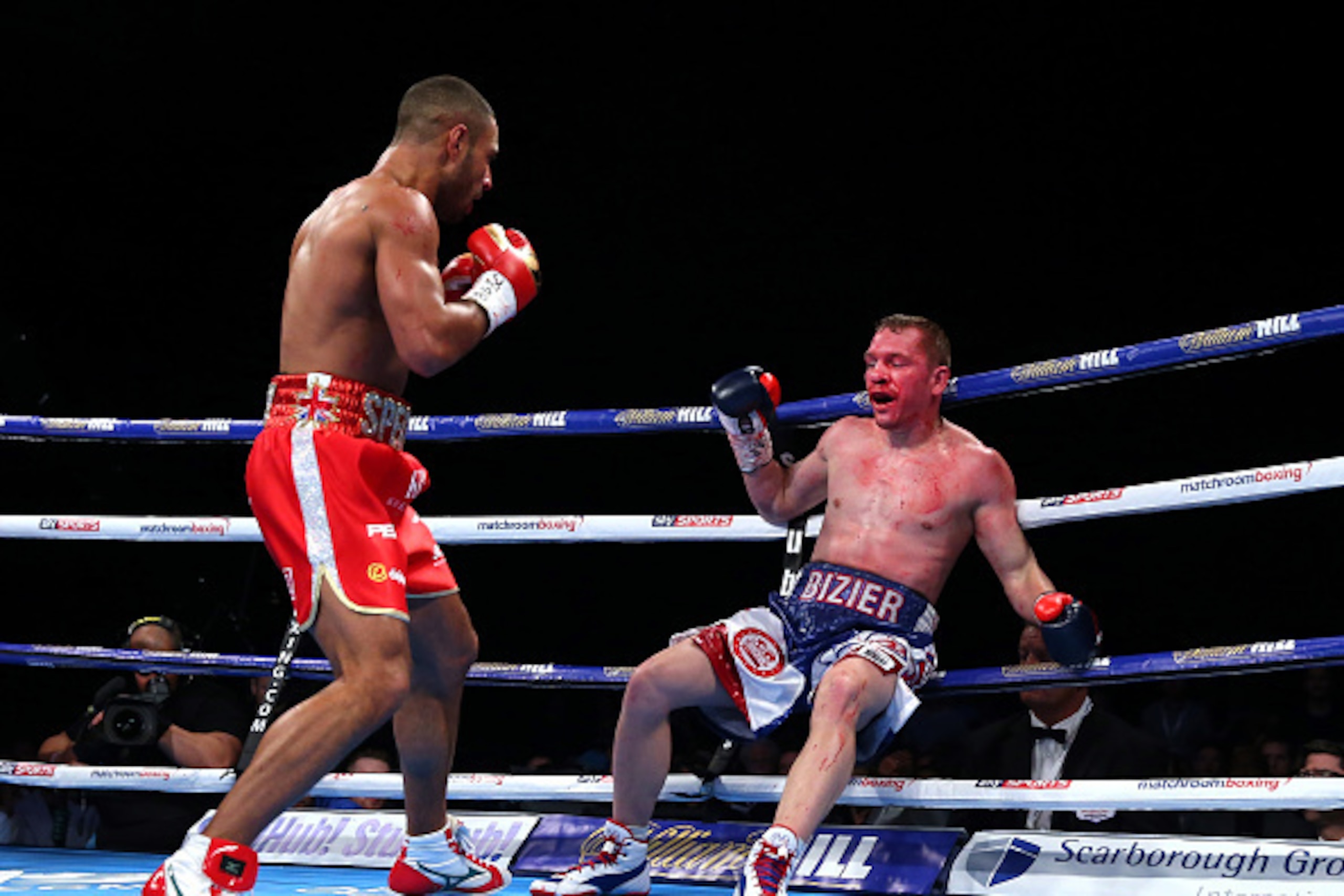 SHEFFIELD, ENGLAND - MARCH 26:  Kell Brook knocks down and stops Kevin Bizier in the second round during his victory in the IBF World Welterweight Championship between Kell Brook and Kevin Bizier at Sheffield Arena on March 26, 2016 in Sheffield, England.