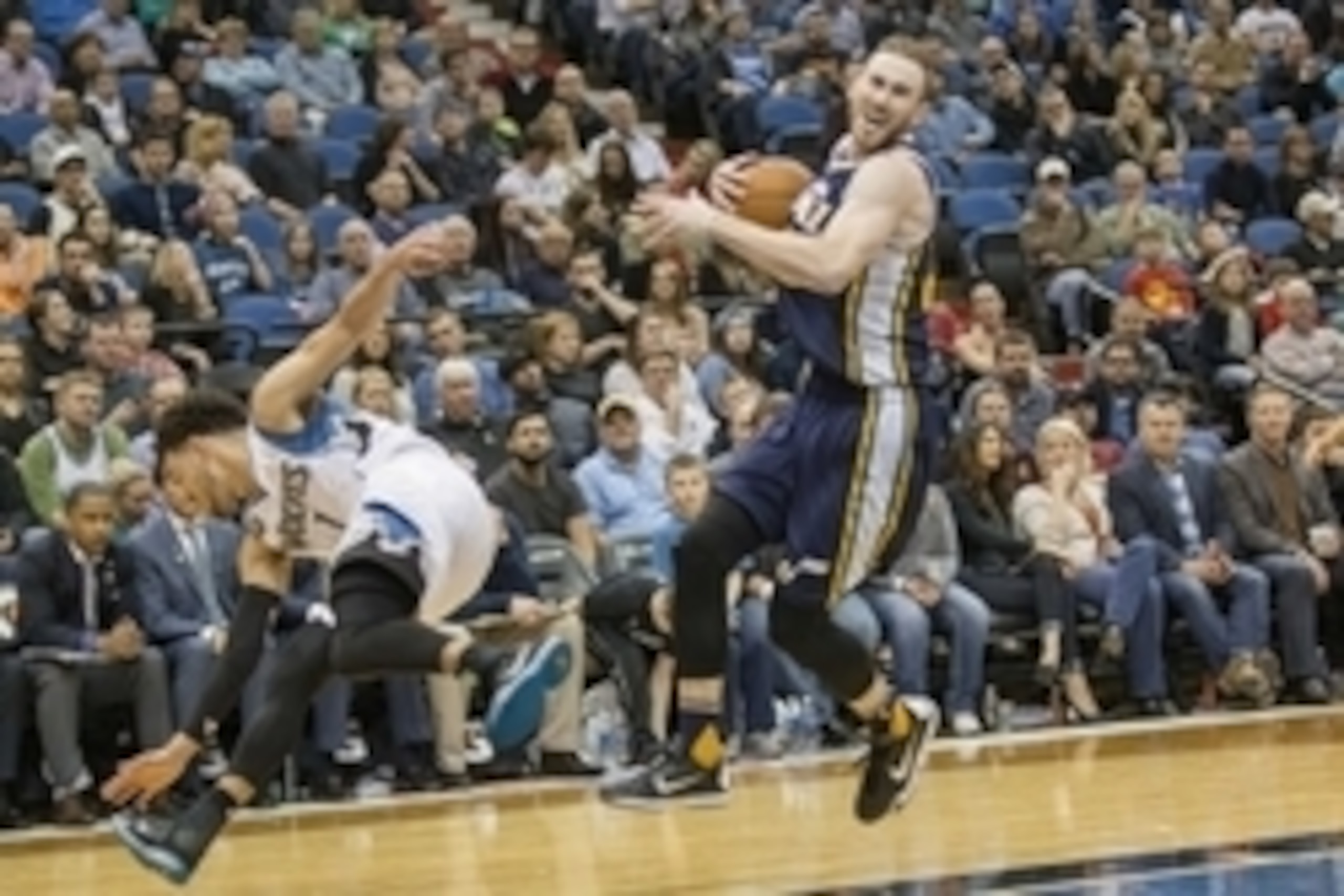 Mar 26, 2016; Minneapolis, MN, USA; Utah Jazz forward Gordon Hayward (20) drives to the basket and gets fouled from Minnesota Timberwolves guard Tyus Jones (1) in the second half at Target Center. the Jazz won 93-84. Mandatory Credit: Jesse Johnson-USA TO