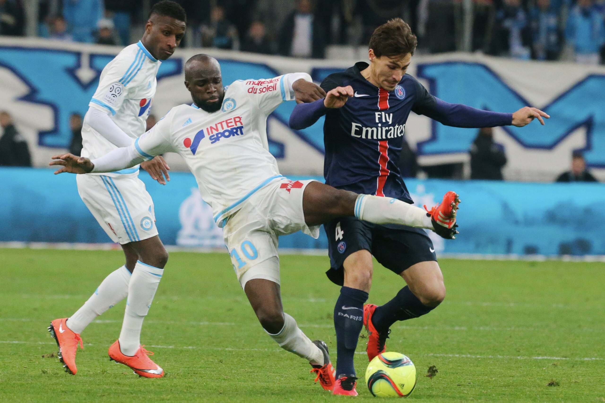 MARSEILLE, FRANCE - FEBRUARY 07:  Lassana Diarra of Olympique de Marseille in action with Benjamin Stambouli of Paris Saint-Germain during the French  Ligue 1 between Olympique de Marseille and Paris Saint-Germain at Stade Velodrome on february 7, 2016 in
