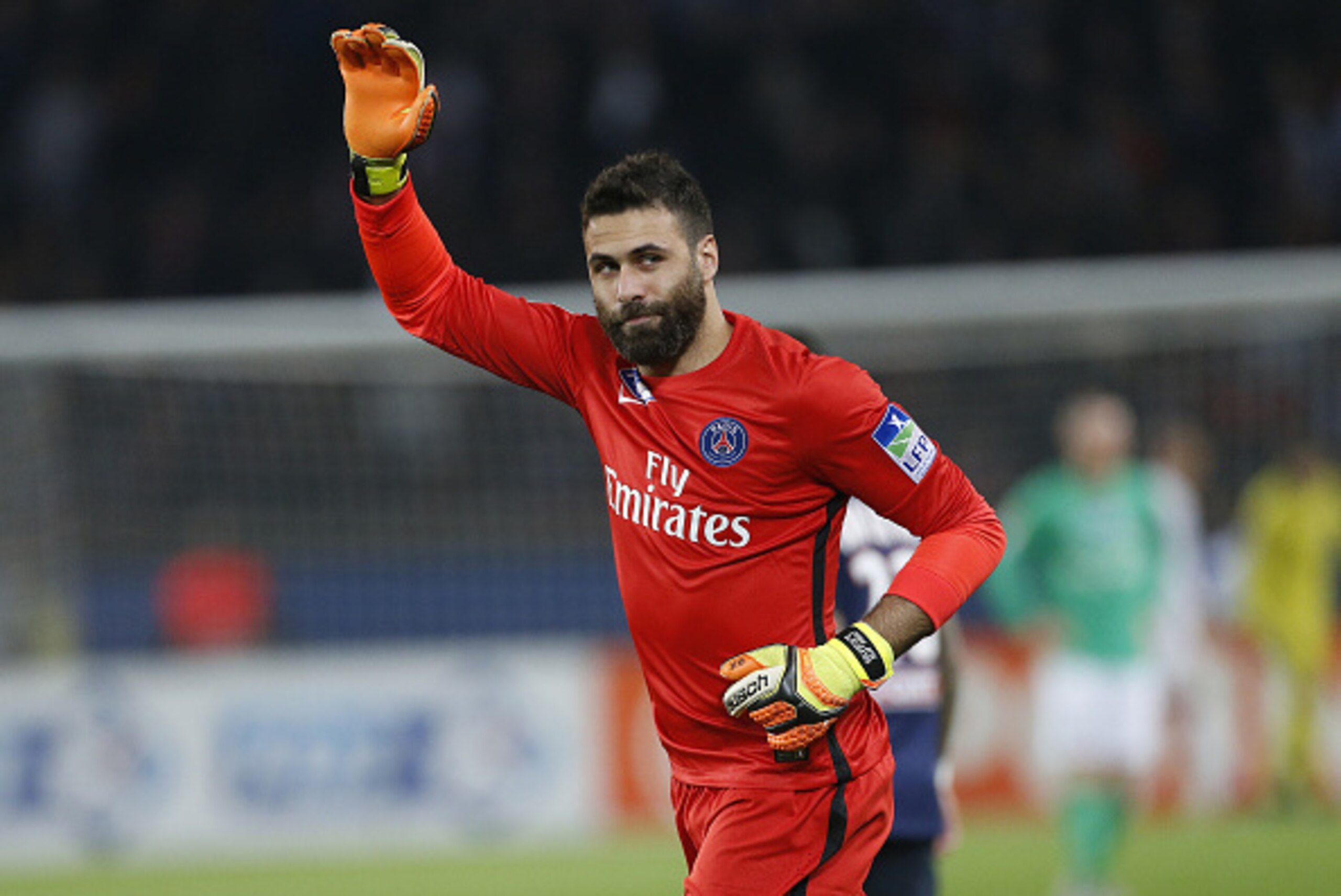 PARIS, FRANCE - DECEMBER 16: Goalkeeper of PSG Salvatore Sirigu thanks the supporters cheering for him during the French League Cup (Coupe de la Ligue) match between Paris Saint-Germain (PSG) and AS Saint-Etienne (ASSE) at Parc des Princes stadium on Dece