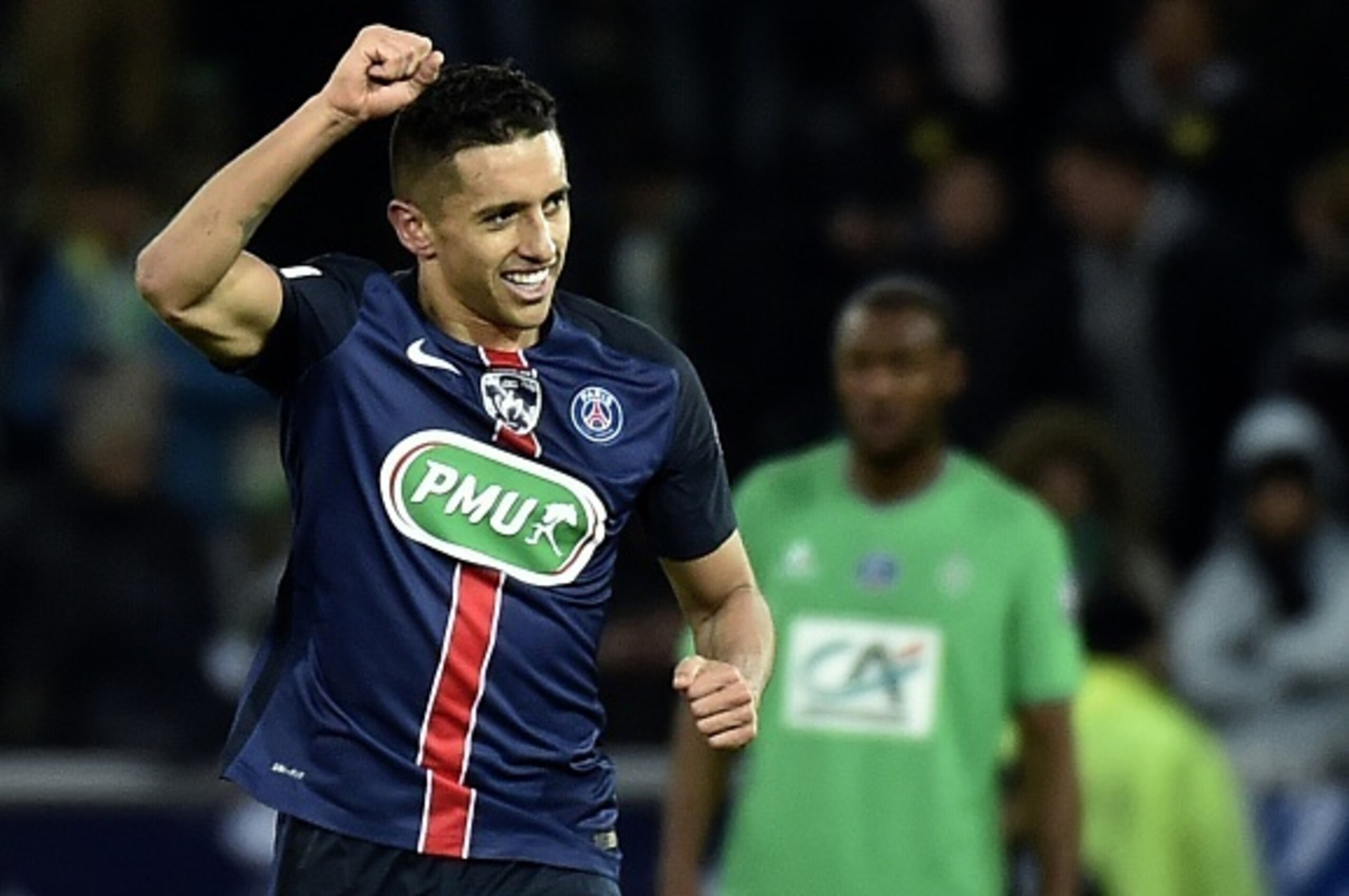 ALTERNATIVE CROP
Paris Saint-Germain's Brazilian defender Marquinhos (R) celebrates after scoring a goal during the French Cup football match between AS Saint-Etienne (ASSE) and Paris Saint-Germain (PSG) on March 2, 2016, at the Geoffroy Guichard Stadium 
