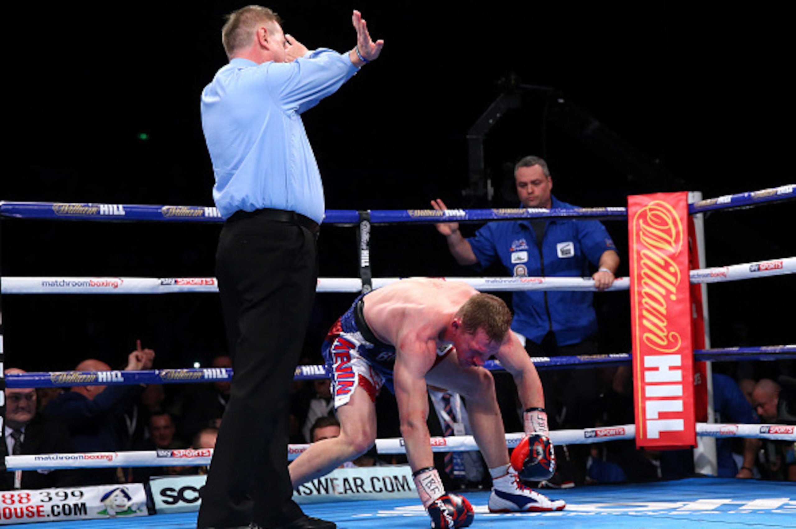 SHEFFIELD, ENGLAND - MARCH 26:  Referee counts out Kevin Bizier in the second round during his defeat to Kell Brook in the IBF World Welterweight Championship between Kell Brook and Kevin Bizier at Sheffield Arena on March 26, 2016 in Sheffield, England. 