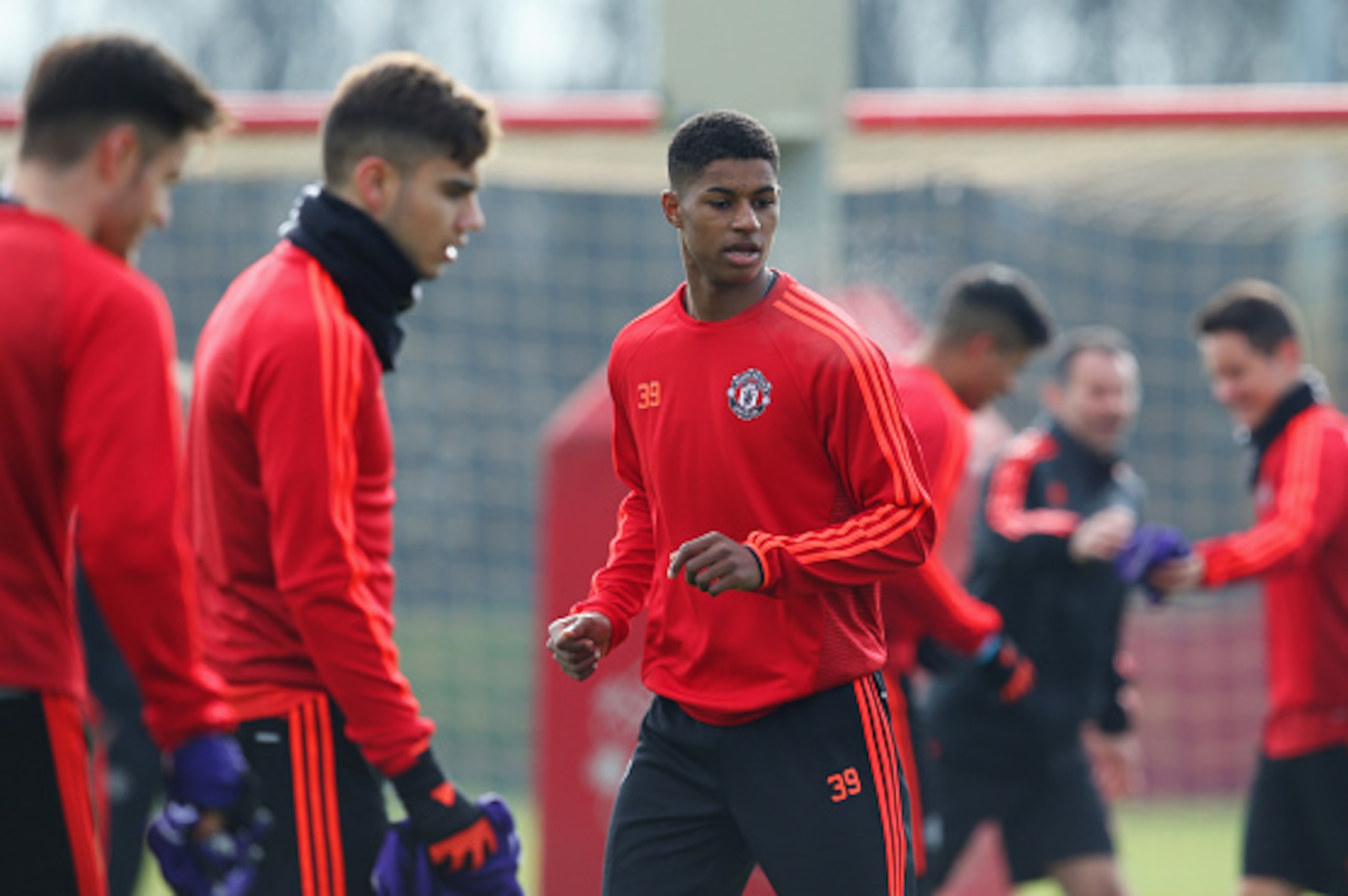 MANCHESTER, ENGLAND - FEBRUARY 24:  Marcus Rashford of Manchester United (39) warms up alongside team mates during a Manchester United training session ahead of their UEFA Europa League round of 32 second leg match against FC Midtjylland at the Aon Traini