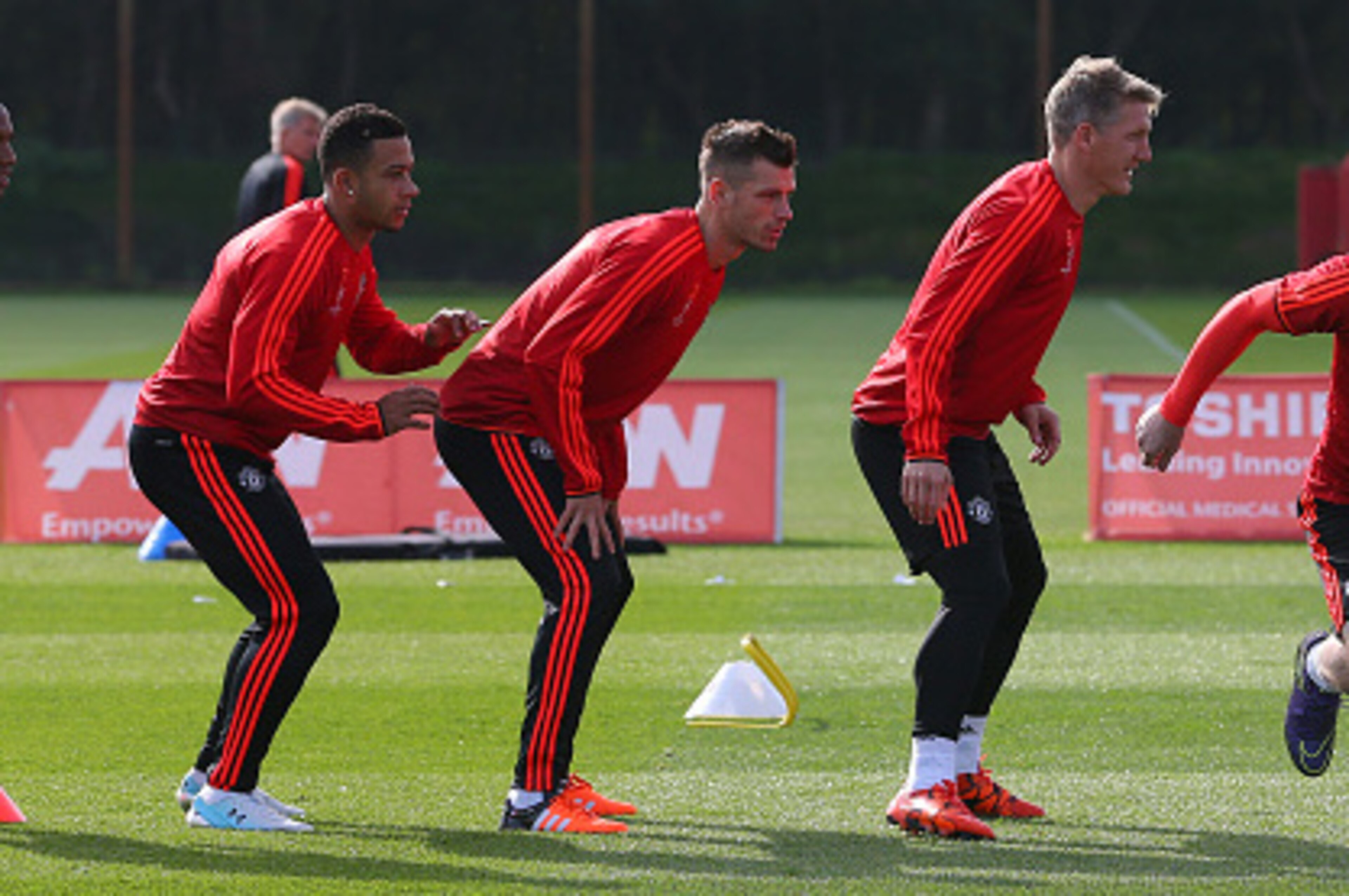 MANCHESTER, ENGLAND - SEPTEMBER 29: L-R Ashley Young, Memphis, Morgan Schneiderlin, Bastian Schweinsteiger and Wayne Rooney of Manchester United during a Manchester United training session at the Aon Training Complex on September 29, 2015 in Manchester, E