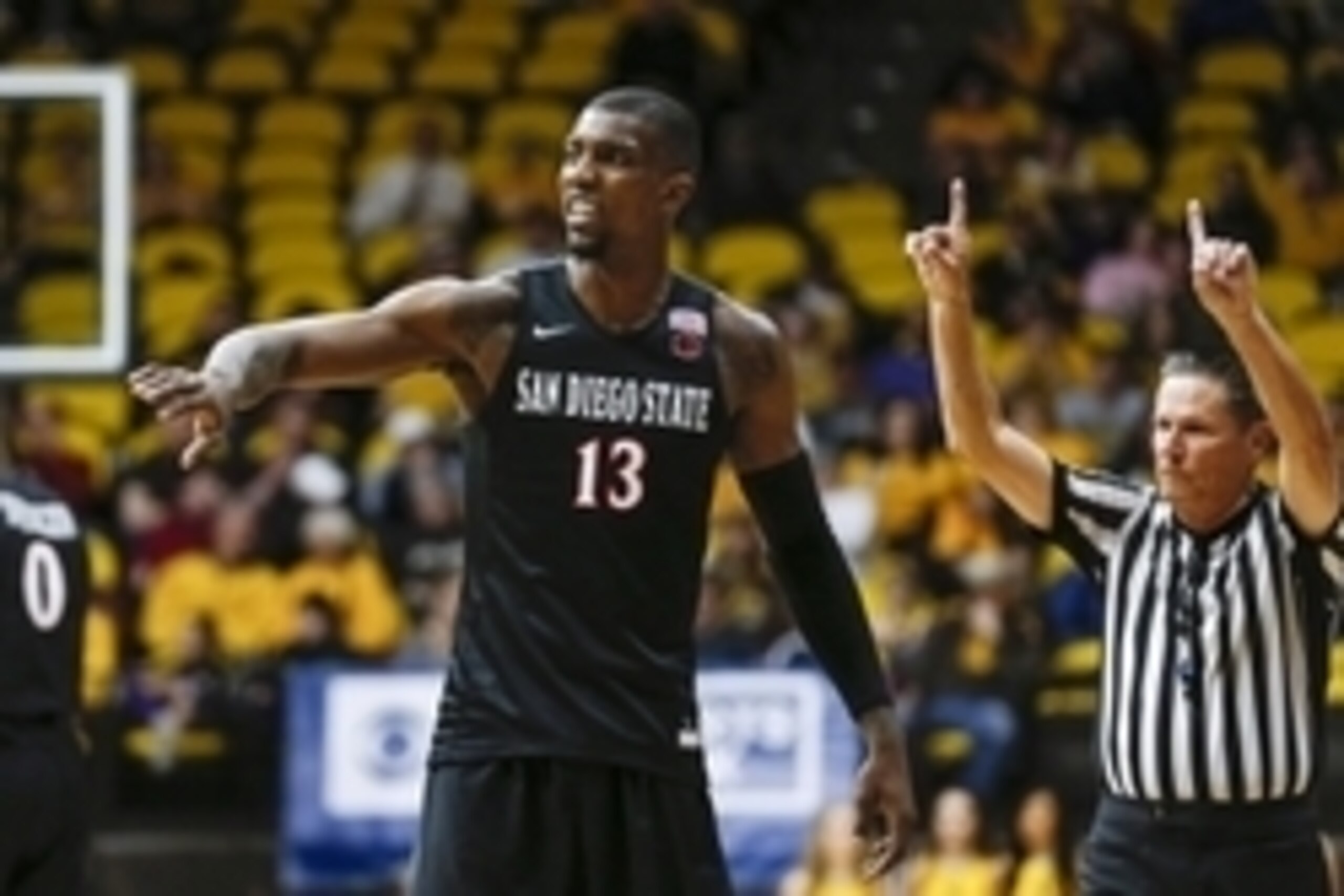 Feb 24, 2016; Laramie, WY, USA; San Diego State Aztecs forward Winston Shepard (13) reacts after a call against the Wyoming Cowboys during the second half at Arena-Auditorium. The Aztecs beat the Cowboys 73-61, Mandatory Credit: Troy Babbitt-USA TODAY Spo