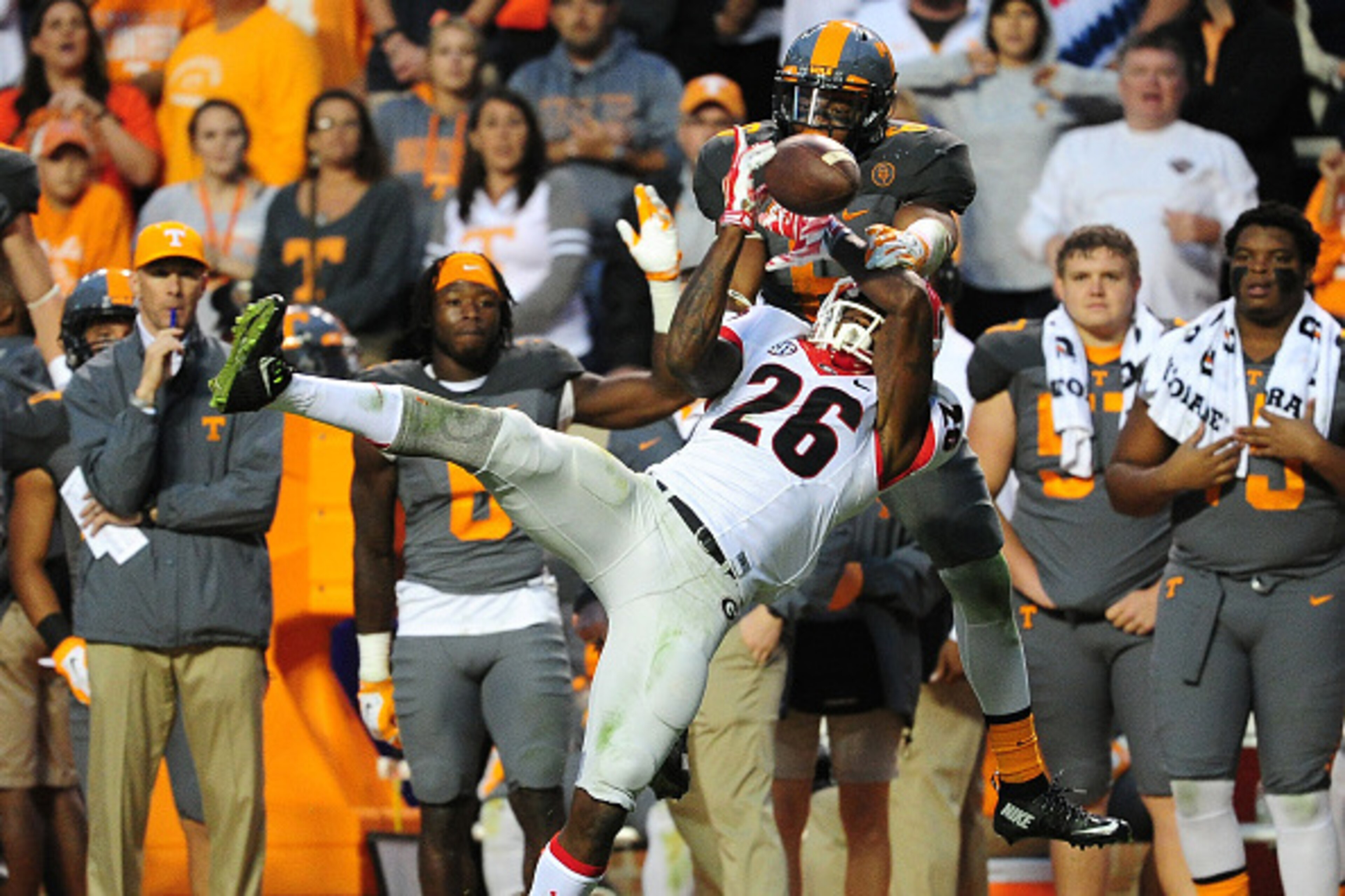 KNOXVILLE, TN - OCTOBER 10: Todd Kelly, Jr. #6 of the Tennessee Volunteers breaks up a pass intended for Malcolm Mitchell #26 of the Georgia Bulldogs on October 10, 2015 at Neyland Stadium in Knoxville, Tennessee. Photo by Scott Cunningham/Getty Images)