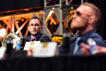 LAS VEGAS, NEVADA - SEPTEMBER 04:  (L-R) Frankie Edgar looks at Conor McGregor during the UFC's Go Big launch event inside MGM Grand Garden Arena on September 4, 2015 in Las Vegas, Nevada. (Photo by Jeff Bottari/Zuffa LLC/Zuffa LLC via Getty Images)