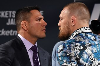 LAS VEGAS, NV - JANUARY 20:  Rafael dos Anjos of Brazil (L) and Conor McGregor of Ireland (R) face off during the UFC 197 on-sale press conference event inside MGM Grand Hotel & Casino on January 20, 2016 in Las Vegas, Nevada. (Photo by Jeff Bottari/Zuffa