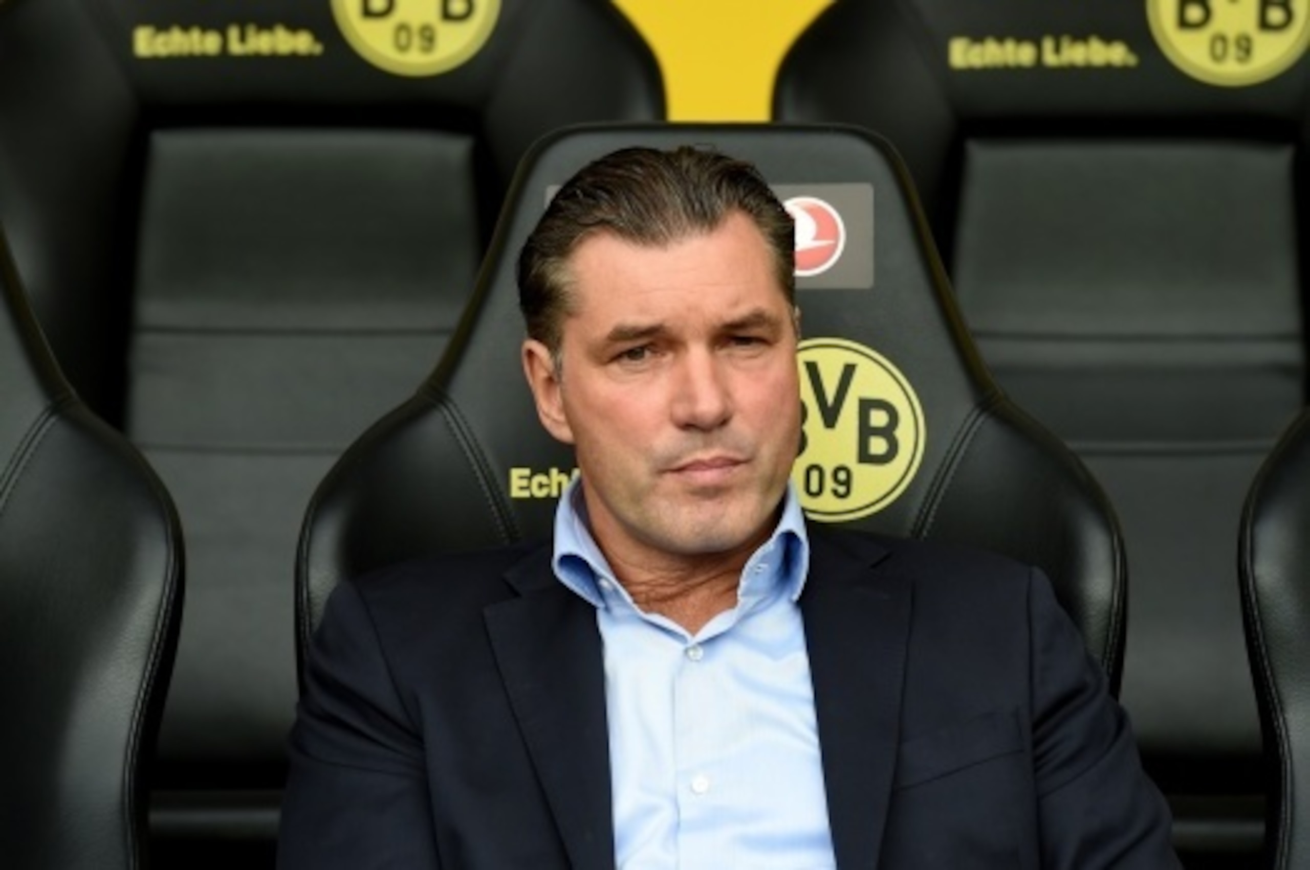 TO GO WITH AFP STORY BY CORALIE FEBVRE
Dortmund´s team sports manager Michael Zorc sits on the bench prior to the German first division Bundesliga football match Borussia Dortmund vs Bayer Leverkusen in Dortmund, western Germany on August 23, 2014. Dortmu TO GO WITH AFP STORY BY CORALIE FEBVRE
Dortmund´s team sports manager Michael Zorc sits on the bench prior to the German first division Bundesliga football match Borussia Dortmund vs Bayer Leverkusen in Dortmund, western Germany on August 23, 2014. Dortmu