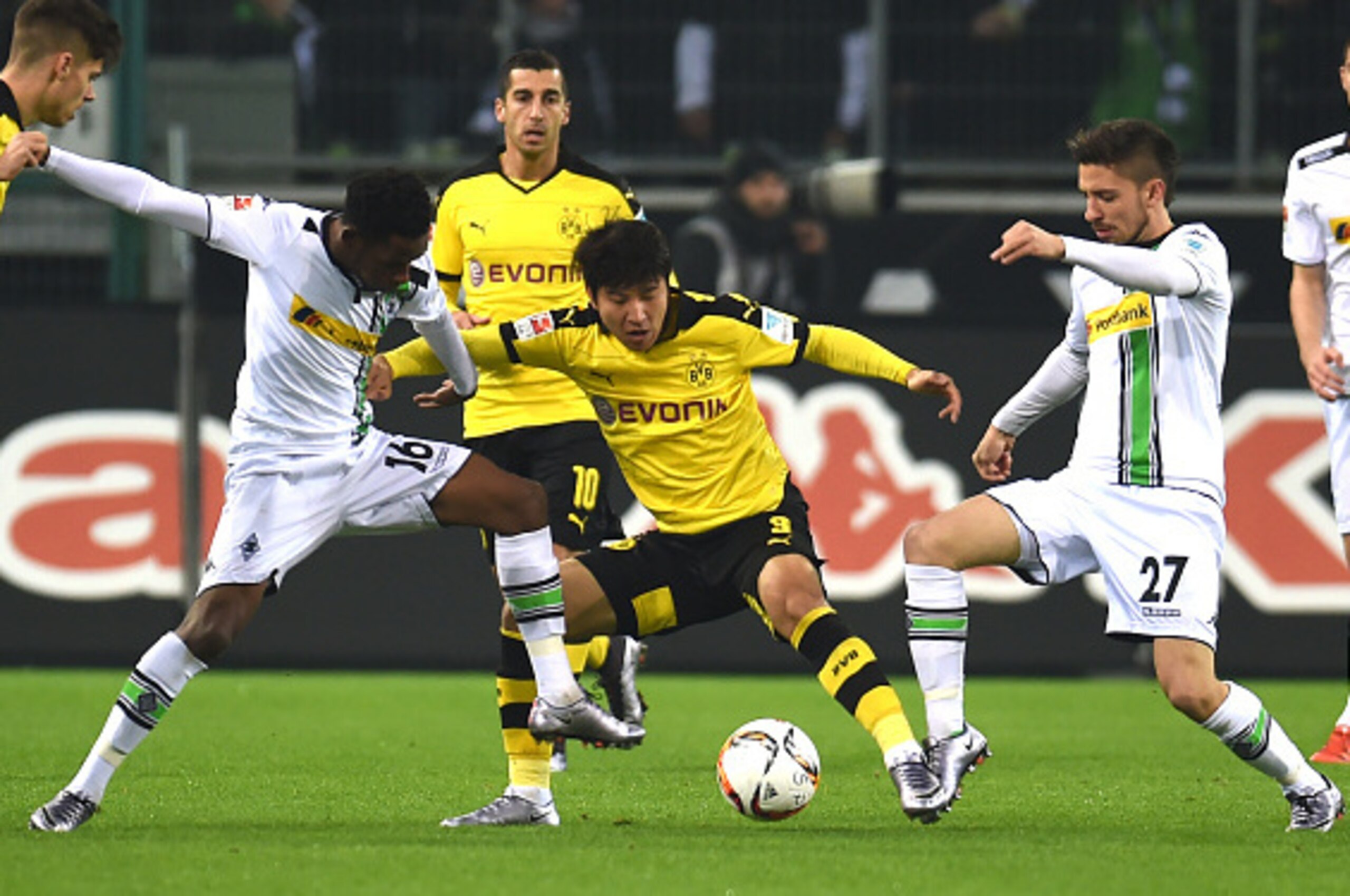 Moenchengladbach's Guinean midfielder Ibrahima Traore (L), Moenchengladbach's midfielder Julian Korb (R) vie with Dortmund's Korean defender Joo-Ho Park (2ndR) during the German first division football Bundesliga match Moenchengladbach vs Dortmund in Moe Moenchengladbach's Guinean midfielder Ibrahima Traore (L), Moenchengladbach's midfielder Julian Korb (R) vie with Dortmund's Korean defender Joo-Ho Park (2ndR) during the German first division football Bundesliga match Moenchengladbach vs Dortmund in Moe