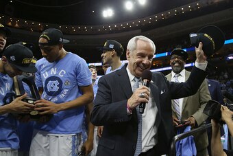 PHILADELPHIA, PA - MARCH 27:  Head coach Roy Williams of the North Carolina Tar Heels celebrates after defeating the Notre Dame Fighting Irish with a score of 74 to 88 in the 2016 NCAA Men's Basketball Tournament East Regional Final at Wells Fargo Center 