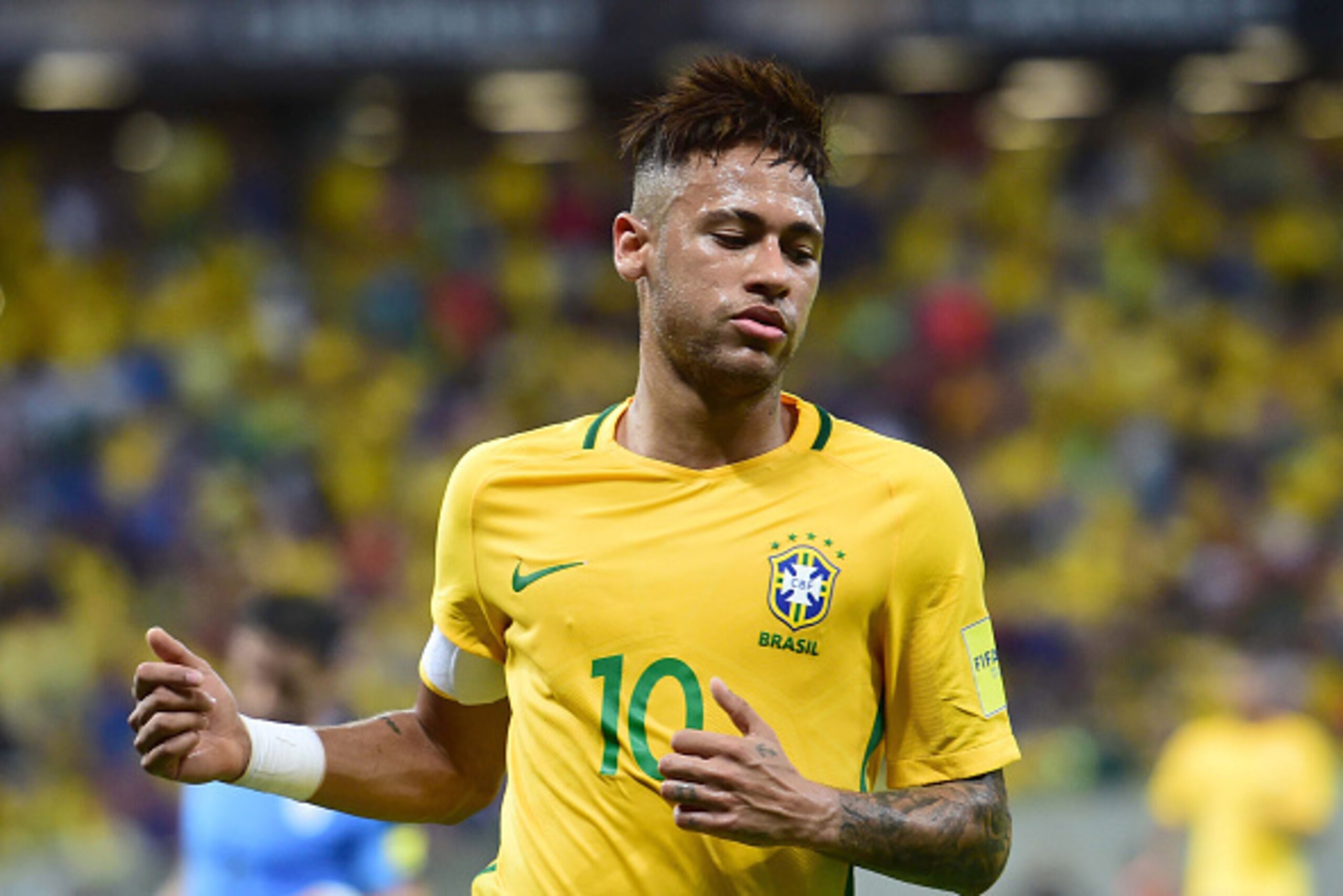 Brazil's Neymar gestures during the Russia 2018 FIFA World Cup South American Qualifiers' football match against Uruguay, in Recife, northeastern Brazil, on March 25, 2016. AFP PHOTO / CHRISTOPHE SIMON / AFP / CHRISTOPHE SIMON (Photo credit shoul Brazil's Neymar gestures during the Russia 2018 FIFA World Cup South American Qualifiers' football match against Uruguay, in Recife, northeastern Brazil, on March 25, 2016. AFP PHOTO / CHRISTOPHE SIMON / AFP / CHRISTOPHE SIMON (Photo credit shoul