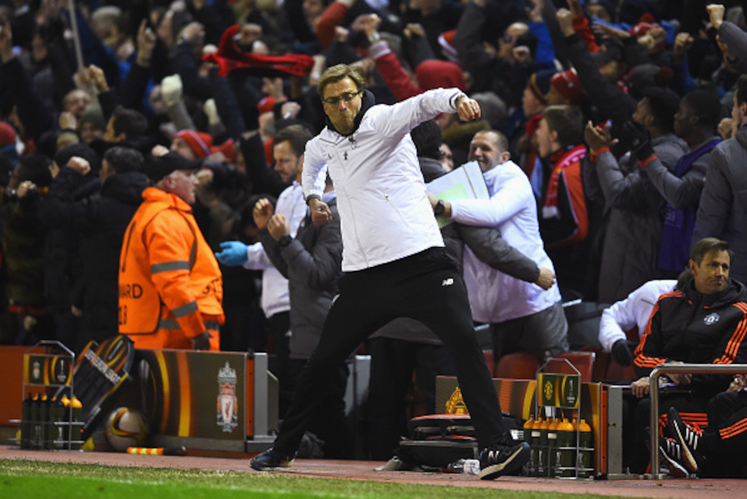 LIVERPOOL, ENGLAND - MARCH 10:  Jurgen Klopp, manager of Liverpool celebrates as Roberto Firmino of Liverpool scores their second goal during the UEFA Europa League Round of 16 first leg match between Liverpool and Manchester United at Anfield on March 10