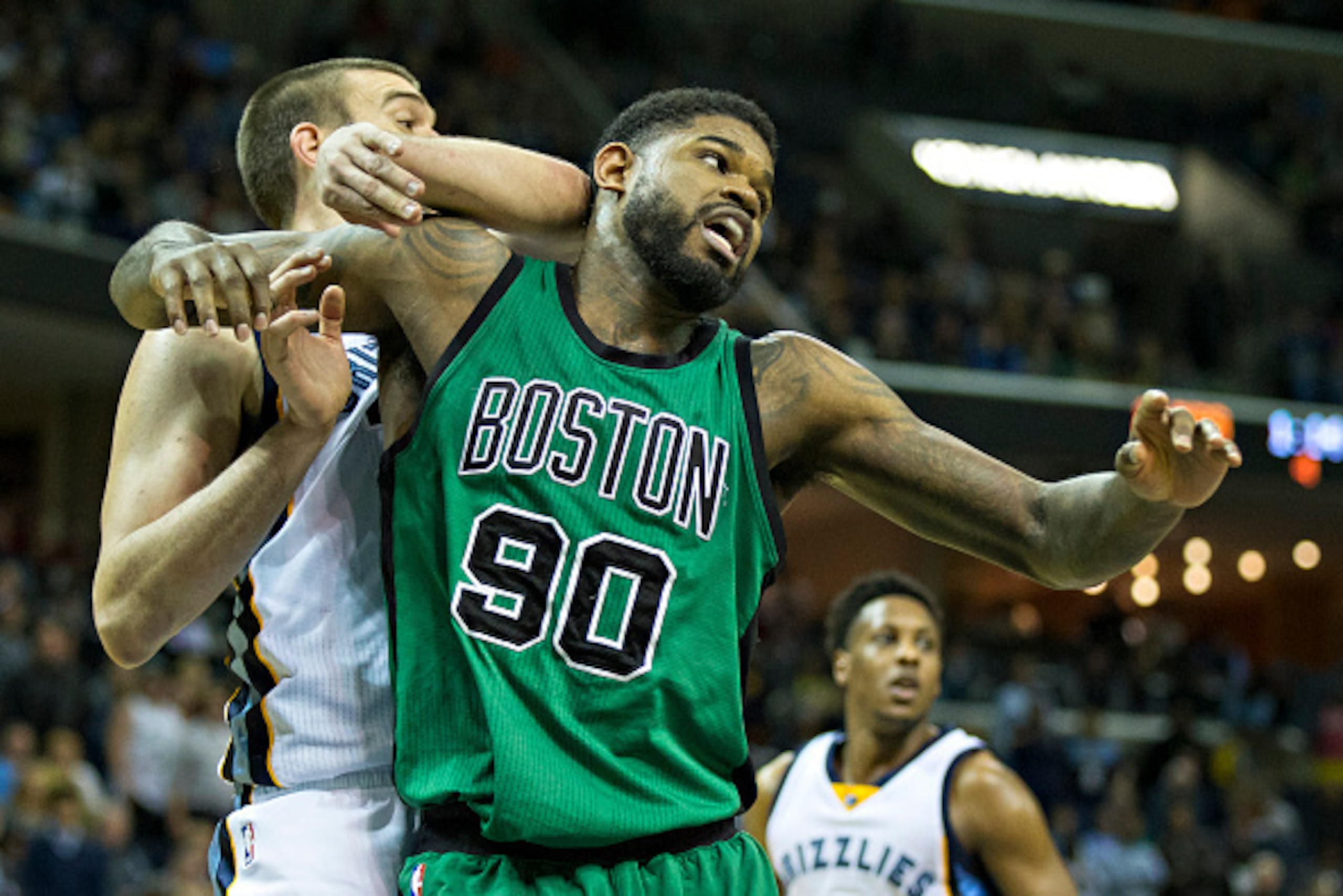 MEMPHIS, TN - JANUARY 10: Marc Gasol #33 of the Memphis Grizzlies goes for a rebound against Amir Johnson #90 of the Boston Celtics at the FedExForum on January 10, 2016 in Memphis, Tennessee. The Grizzlies defeated the Celtics 101-98. NOTE TO USER: User 
