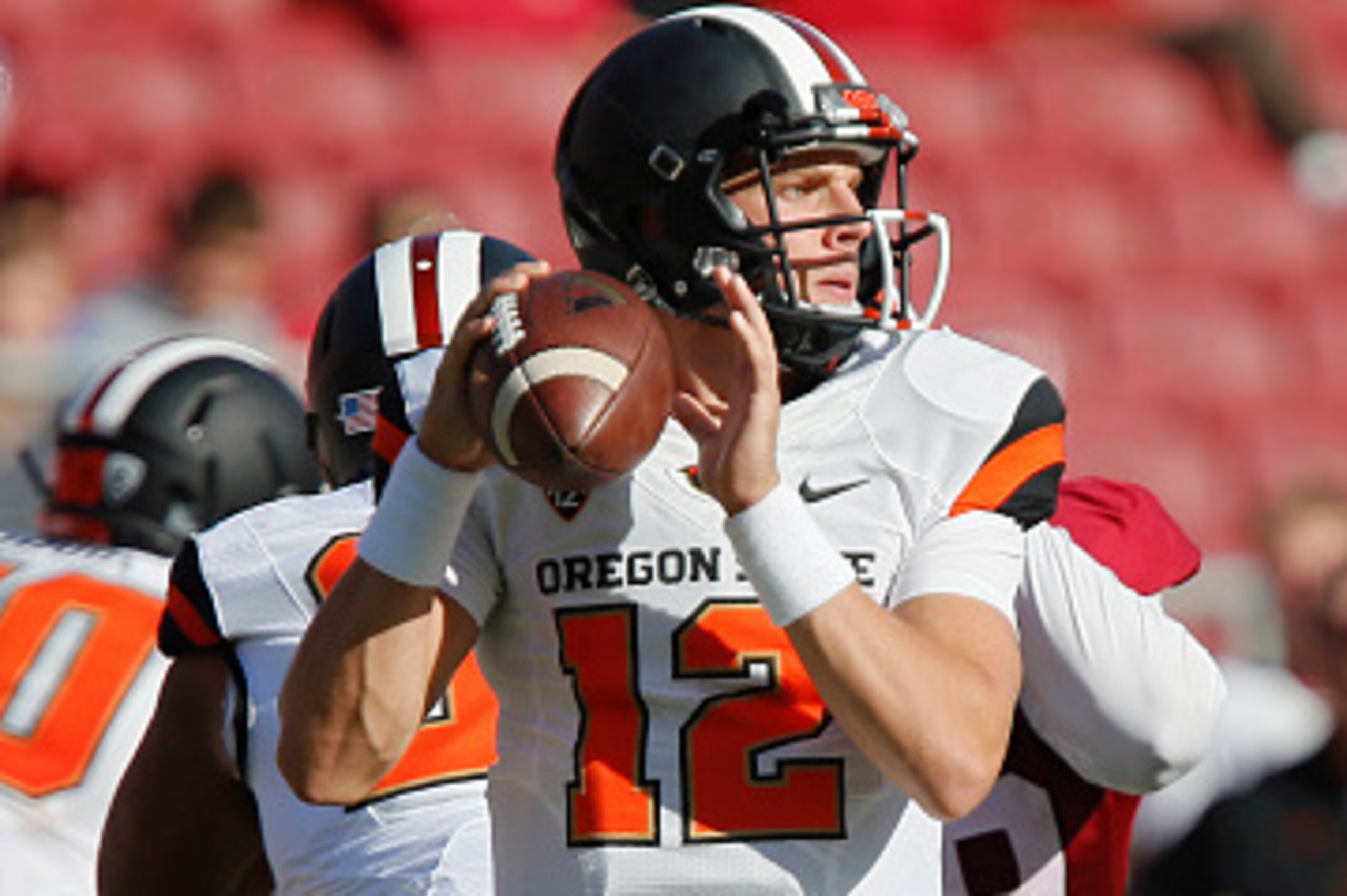 PALO ALTO, CA - OCTOBER 25:  Quarterback Luke Del Rio #12 of the Oregon State Beavers looks for a receiver against the Stanford Cardinal in the fourth quarter on October 25, 2014 at Stanford Stadium in Palo Alto, California.  Stanford won 38-14.  (Photo b