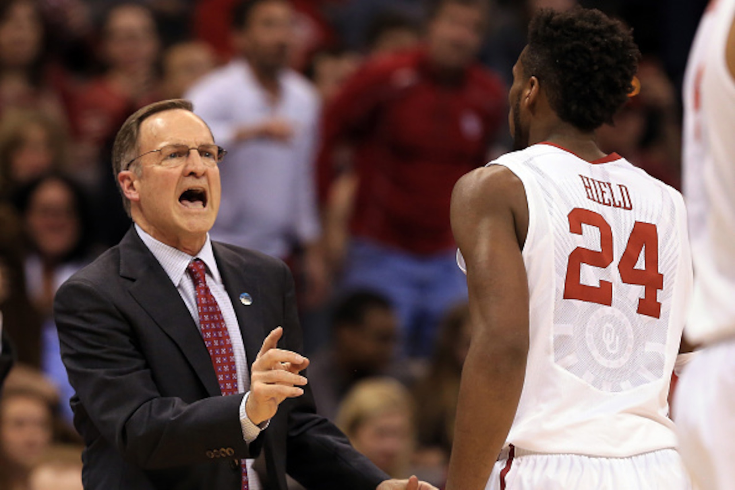 OKLAHOMA CITY, OK - MARCH 20:  Head coach Lon Kruger of the Oklahoma Sooners talks with Buddy Hield #24 in the second half against the Virginia Commonwealth Rams during the second round of the 2016 NCAA Men's Basketball Tournament at Chesapeake Energy Are