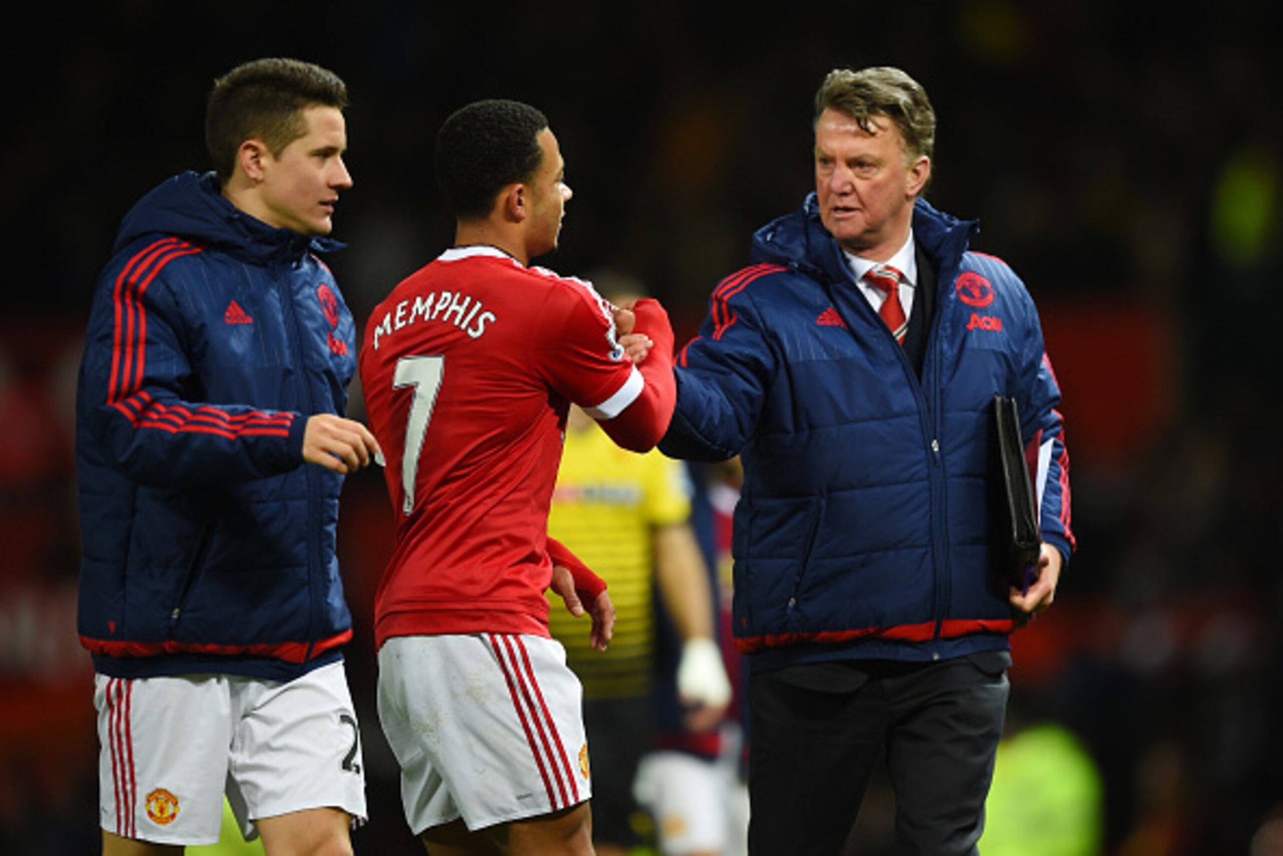 MANCHESTER, ENGLAND - MARCH 02: Louis van Gaal Manager of Manchester United shakes hands with Memphis Depay after the Barclays Premier League match between Manchester United and Watford at Old Trafford on March 2, 2016 in Manchester, England.  (Photo by S
