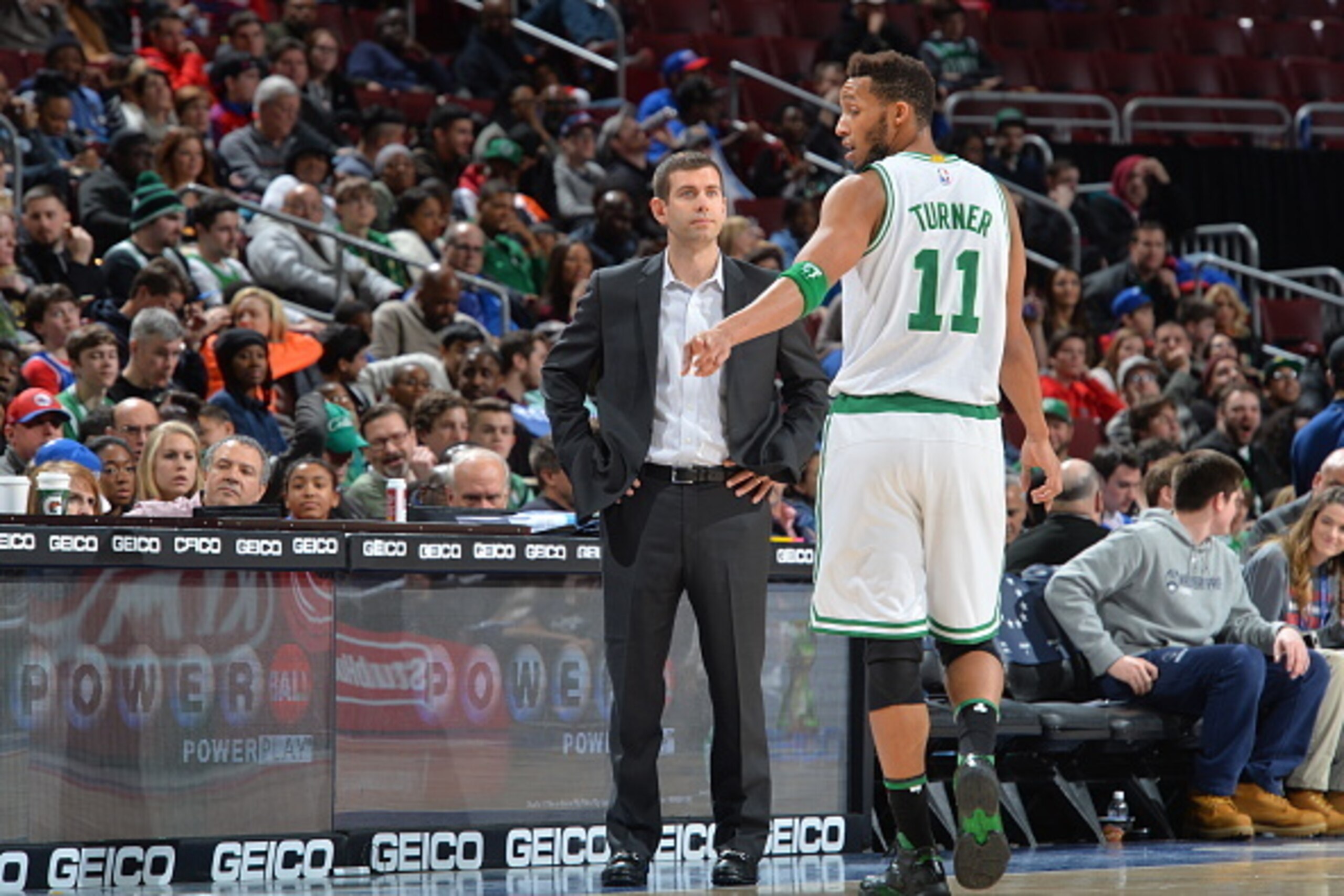 PHILADELPHIA,PA - JANUARY 24: Head Coach Brad Stevens of the Boston Celtics speaks with Evan Turner #11 against the Philadelphia 76ers at Wells Fargo Center on January 24, 2015 in Philadelphia, Pennsylvania NOTE TO USER: User expressly acknowledges and ag