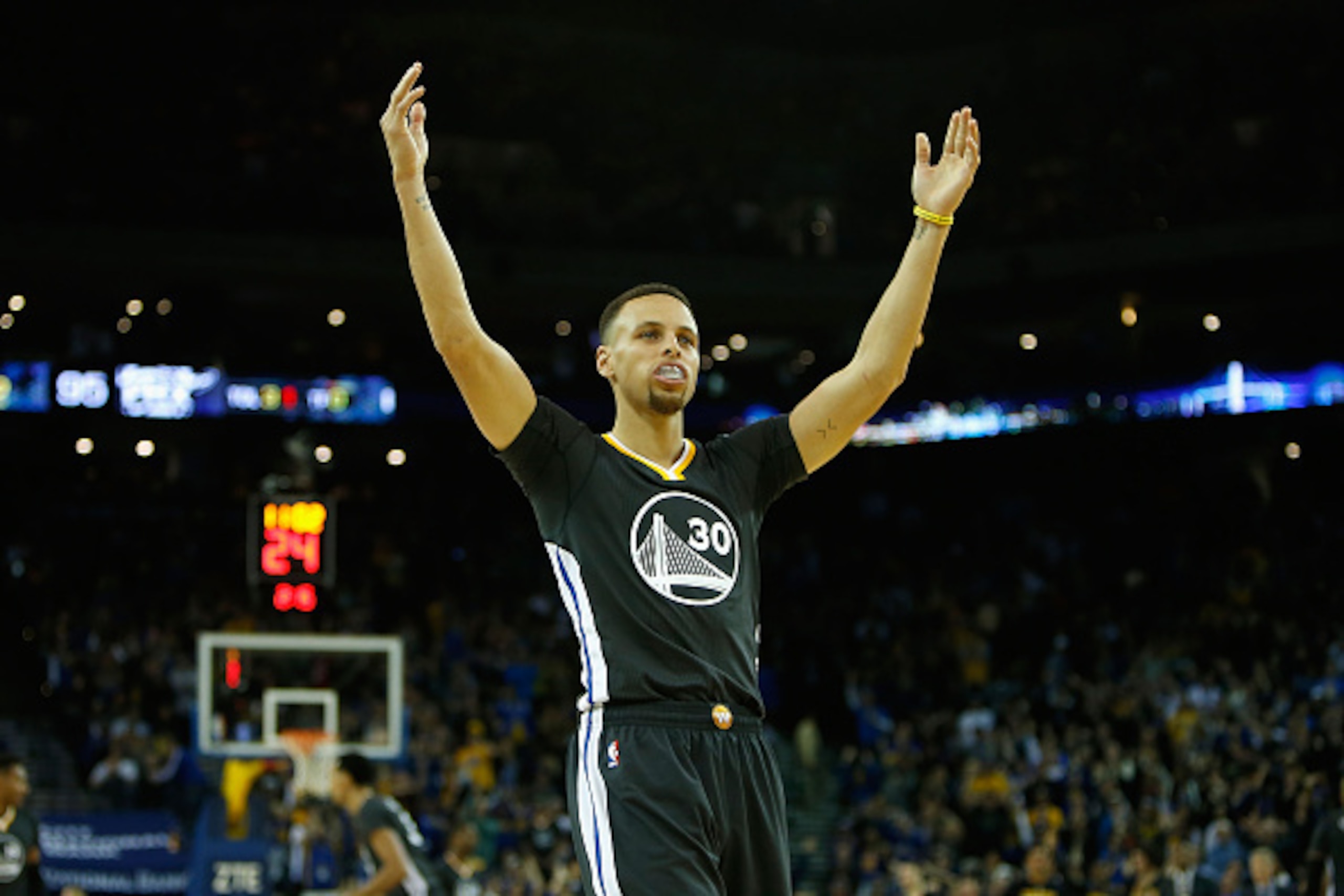 OAKLAND, CA - MARCH 12: Stephen Curry #30 of the Golden State Warriors celebrates a basket against the Phoenix Suns at ORACLE Arena on March 12, 2016 in Oakland, California. NOTE TO USER: User expressly acknowledges and agrees that, by downloading and or 