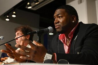 NEW YORK - AUGUST 08:  David Ortiz of the Boston Red Sox speaks to the media regarding his positive test for a performance enhancing substance as part of the 2003 Survey Test during a press conference at Yankee Stadium on  August 8, 2009 in the Bronx boro