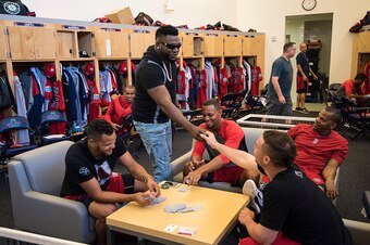 FT. MYERS, FL - FEBRUARY  22:   David Ortiz  #34 of the Boston Red greets players in the clubhouse after arriving in Spring Training camp  on February 22, 2016  at Fenway South in Fort Myers, Florida . (Photo by Michael Ivins/Boston Red Sox/Getty Images)