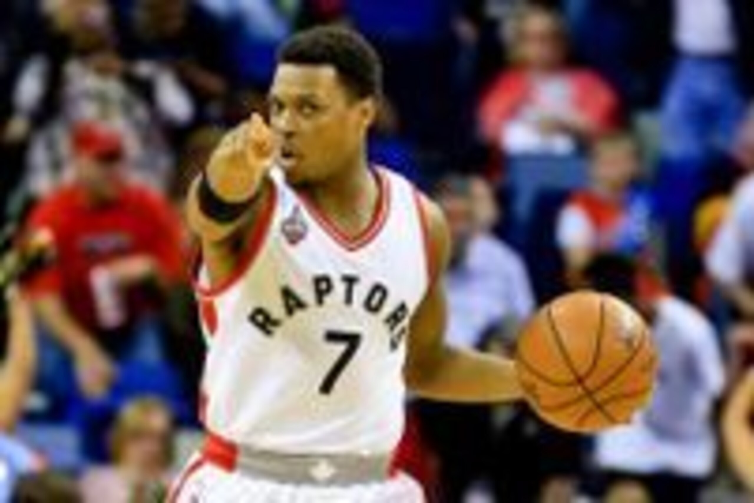 Mar 26, 2016; New Orleans, LA, USA; Toronto Raptors guard Kyle Lowry (7) points down the court against the New Orleans Pelicans during the first quarter of a game at the Smoothie King Center. Mandatory Credit: Derick E. Hingle-USA TODAY Sports