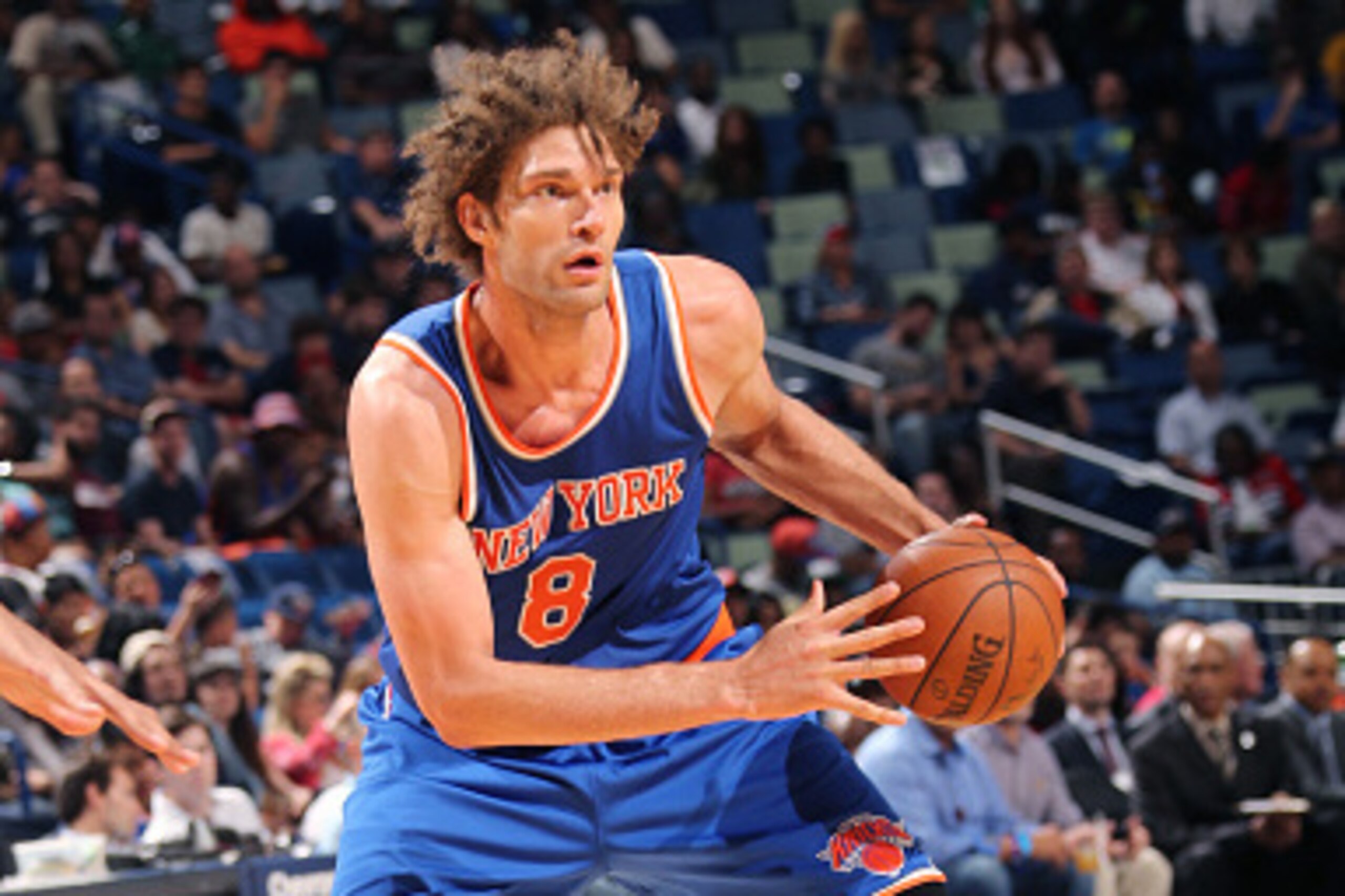NEW ORLEANS, LA  - MARCH 28: Robin Lopez #8 of the New York Knicks drives to the basket against the New Orleans Pelicans during the game on March 28, 2016 at Smoothie King Center in New Orleans, Louisiana. NOTE TO USER: User expressly acknowledges and agr