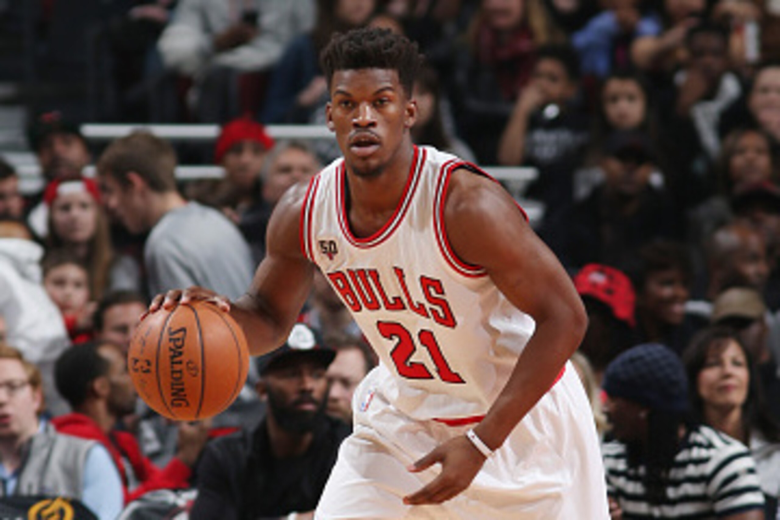 CHICAGO, IL  - MARCH 28: Jimmy Butler #21 of the Chicago Bulls drives to the basket against the Atlanta Hawks during the game on March 28, 2016 at United Center in Chicago, Illinois. NOTE TO USER: User expressly acknowledges and agrees that, by downloadin