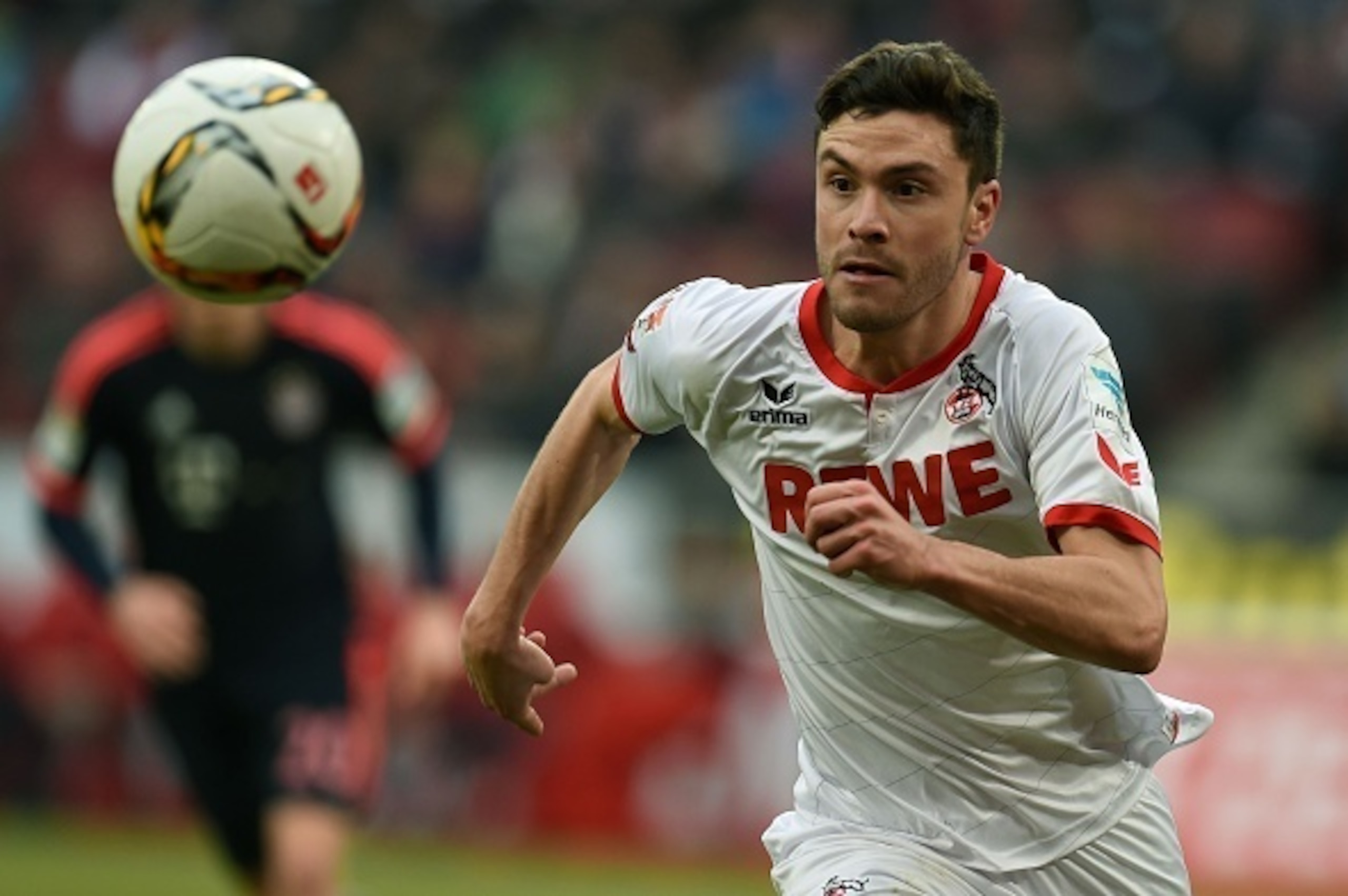 Cologne's defender Jonas Hector runs with the ball during the German Bundesliga first division football match between FC Cologne vs FC Bayern Munich in Cologne, western Germany, on March 19, 2016. / AFP / PATRIK STOLLARZ / RESTRICTIONS: DURING MATCH TIME: