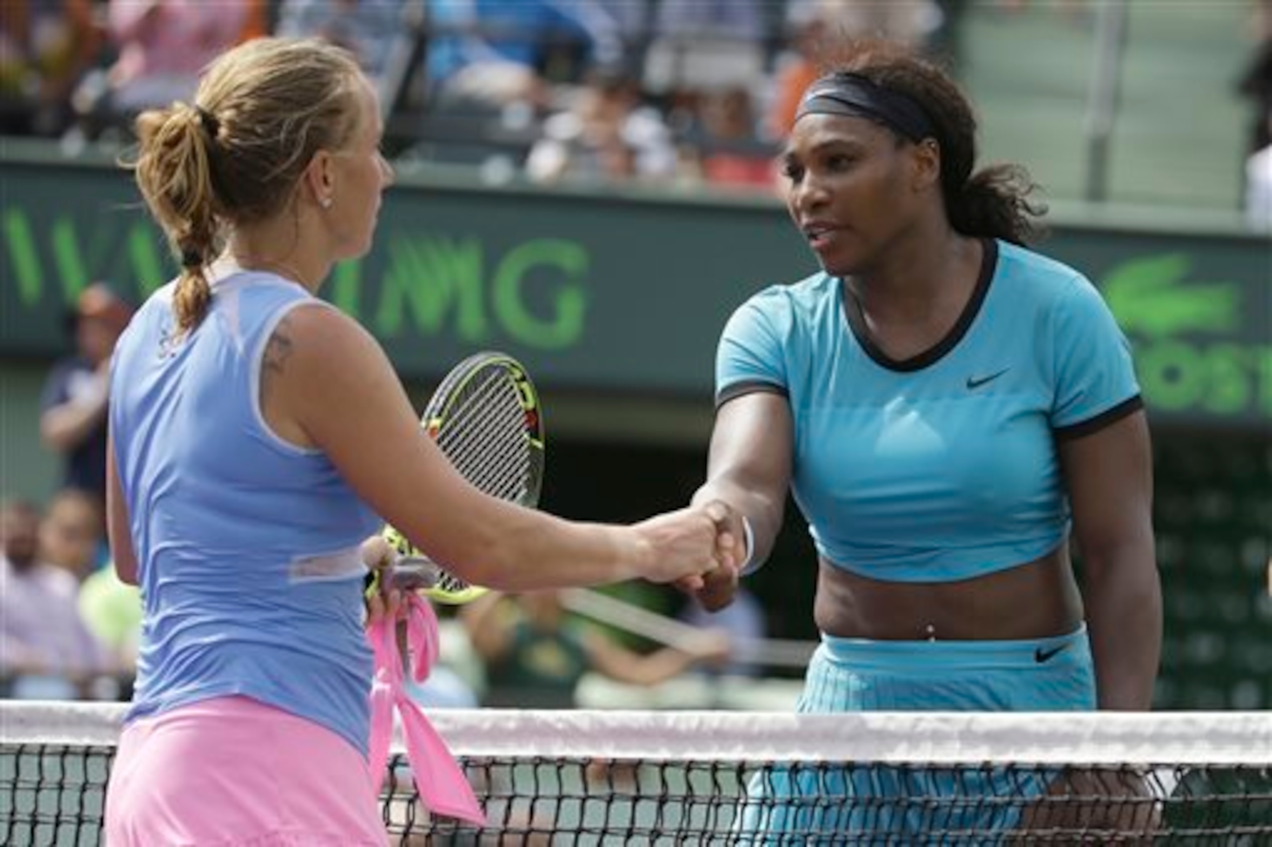 Serena Williams congratulates Svetlana Kuznetsova after their fourth-round match at the 2016 Miami Open.