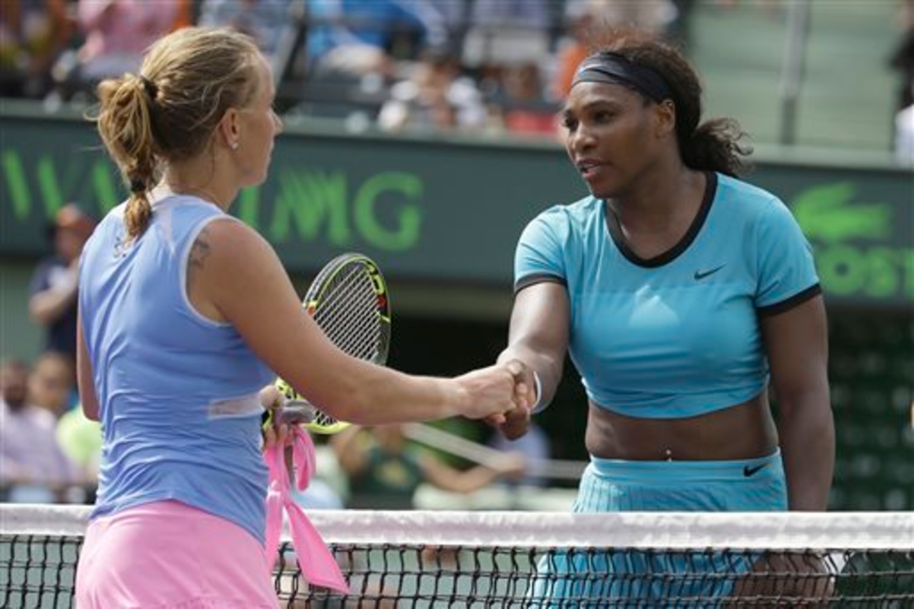 Serena Williams congratulates Svetlana Kuznetsova after their fourth-round match at the 2016 Miami Open.