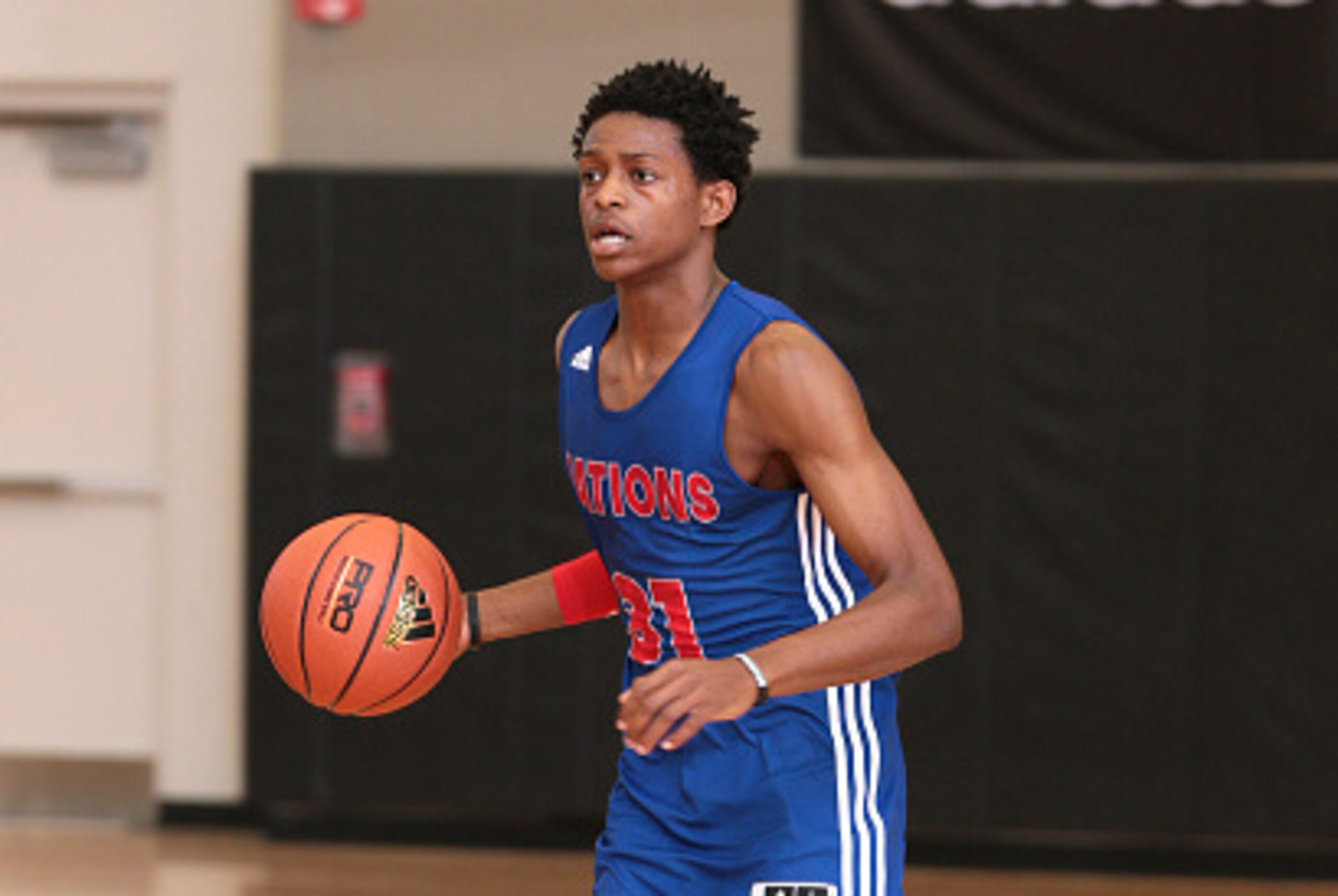 ATLANTA, GA - MAY 2: DeAaron Fox #31 in blue brings the ball up the court during Adidas Nations Atlanta on May 2, 2015 at North Atlanta High School in Atlanta, Georgia. (Photo by Kelly Kline/Getty Images)