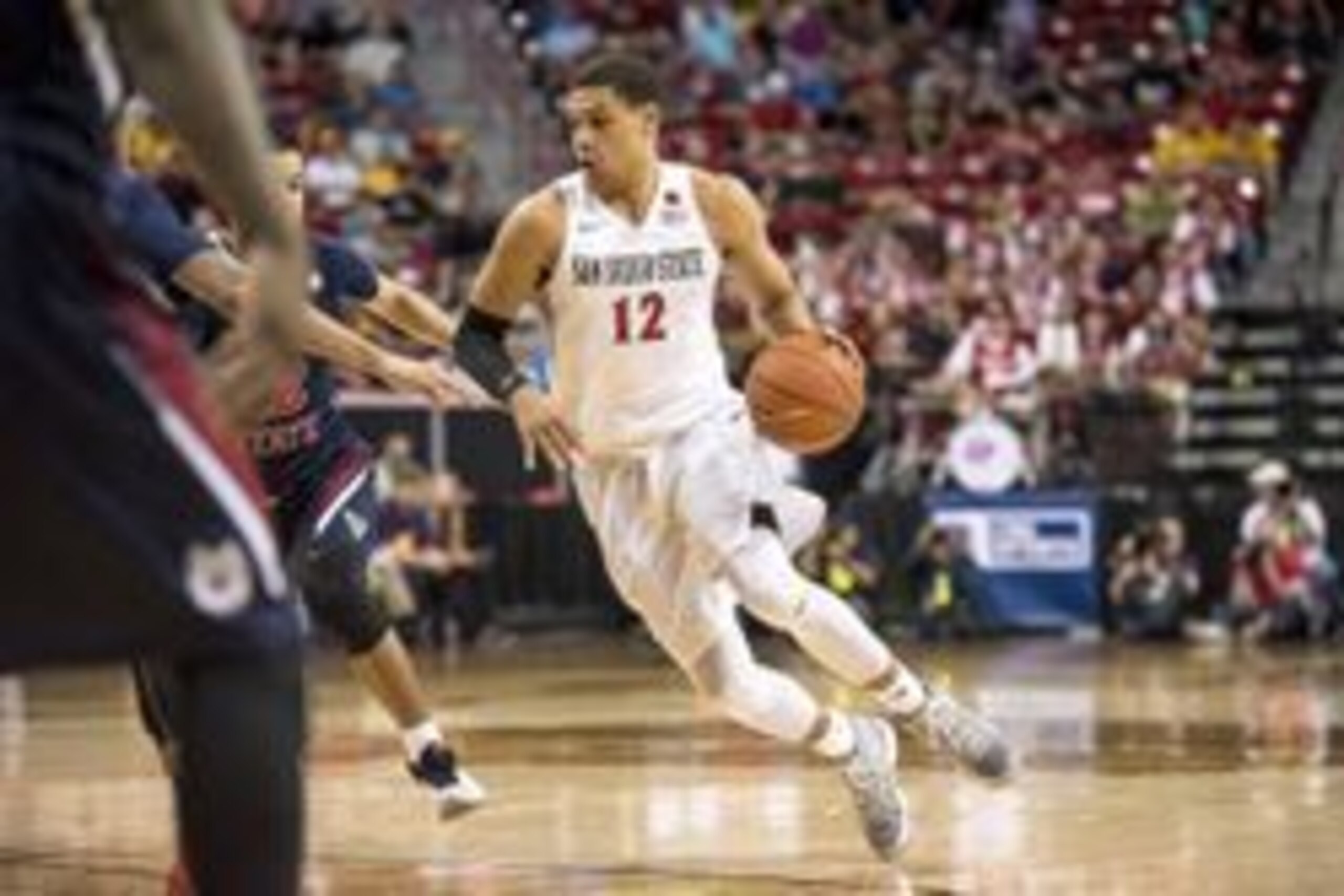 Mar 12, 2016; Las Vegas, NV, USA; San Diego State Aztecs guard Trey Kell (12) moves with the ball against the Fresno State Bulldogs in the second half during the Mountain West Conference Tournament at Thomas & Mack Center. Fresno State won 68-63. Mandator