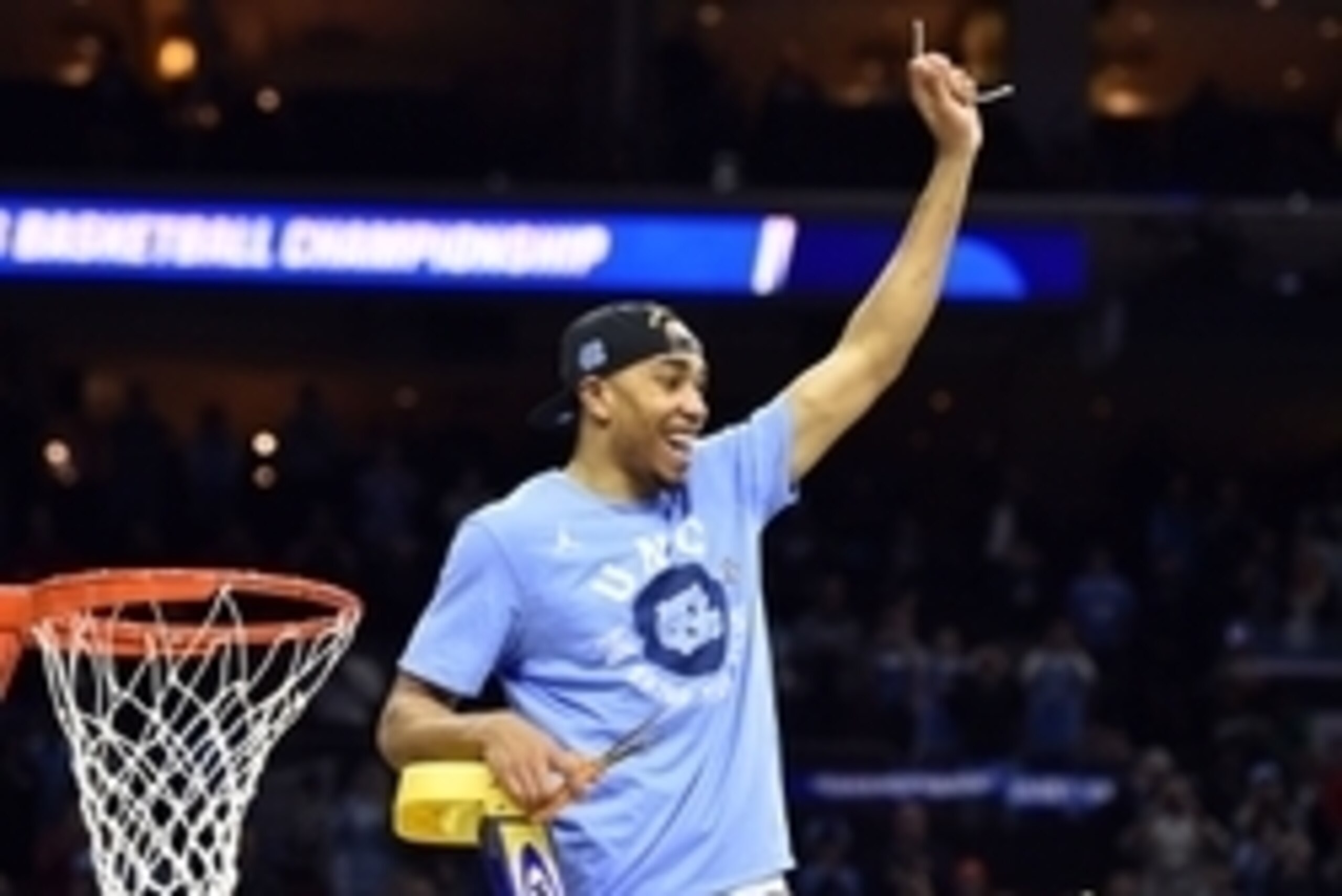Mar 27, 2016; Philadelphia, PA, USA; North Carolina Tar Heels forward Brice Johnson (11) cuts down the net after defeating Notre Dame Fighting Irish in the championship game in the East regional of the NCAA Tournament at Wells Fargo Center. Carolina won 8
