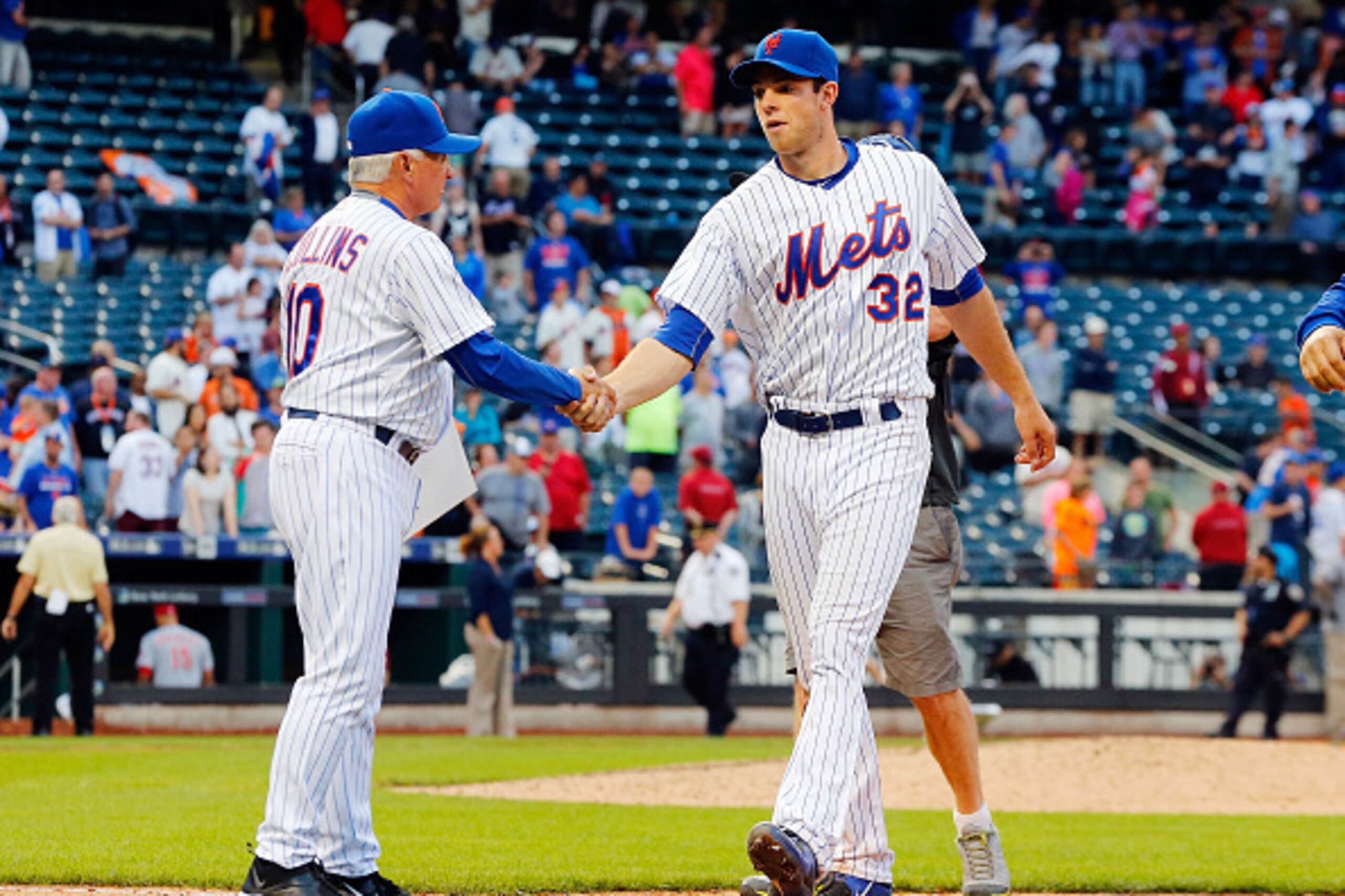 NEW YORK, NY - JUNE 28:  Steven Matz #32 and manager Terry Collins #10 of the New York Mets after a game against the Cincinnati Reds at Citi Field on June 28, 2015 in the Flushing neighborhood of the Queens borough of New York City. The Mets defeated the 