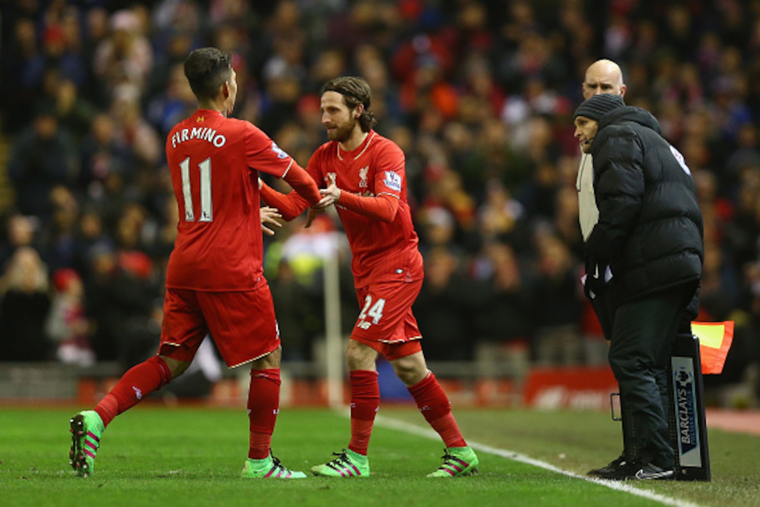 LIVERPOOL, ENGLAND - MARCH 02:  Joe Allen comes on to replace Roberto Firmino of Liverpool during the Barclays Premier League match between Liverpool and Manchester City at Anfield on March 2, 2016 in Liverpool, England.  (Photo by Clive Brunskill/Getty I