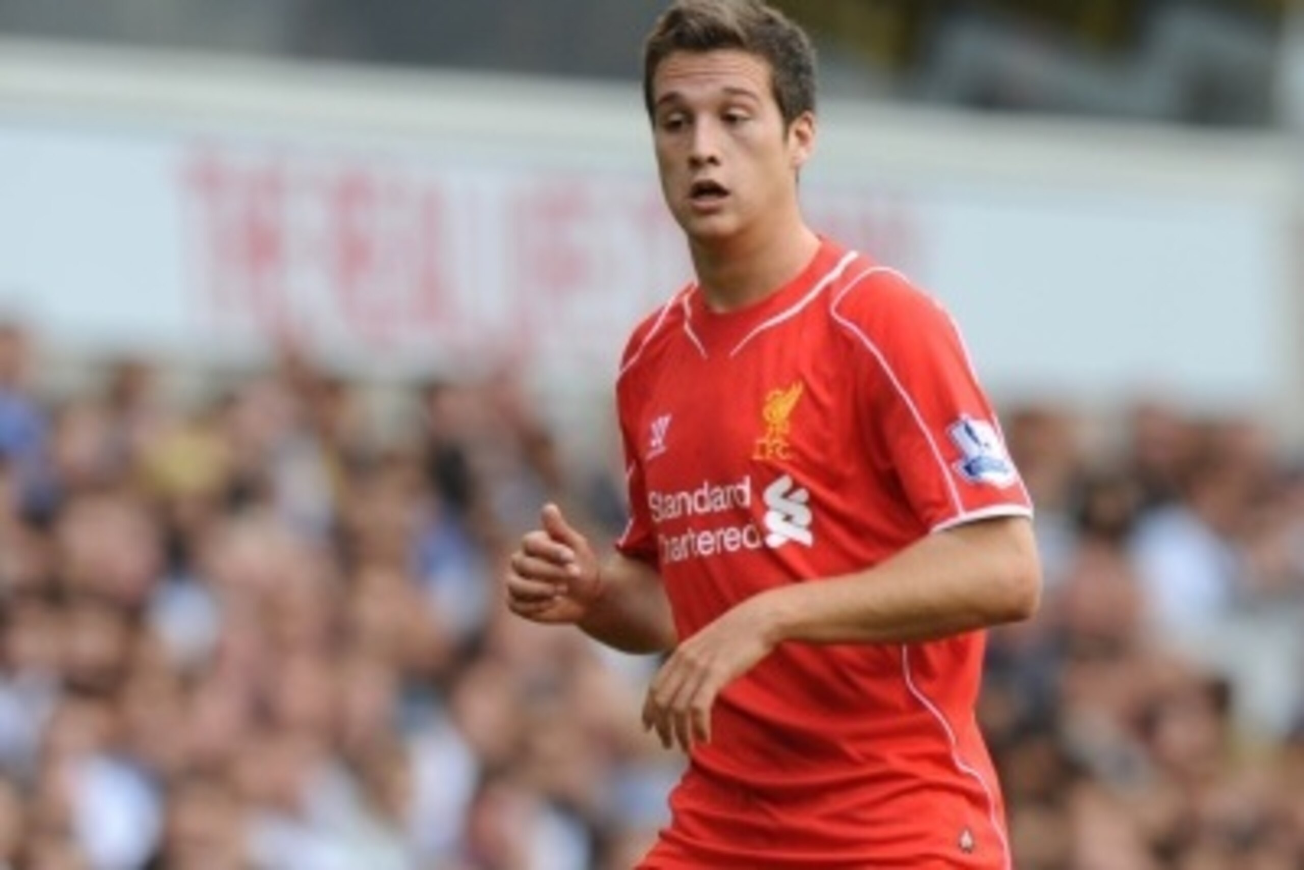 Liverpool's Spanish defender Javier Manquillo runs with the ball during the English Premier League football match between Tottenham Hotspur and Liverpool at White Hart Lane in London on August 31, 2014. AFP PHOTO / OLLY GREENWOOD

RESTRICTED TO EDITORIAL 