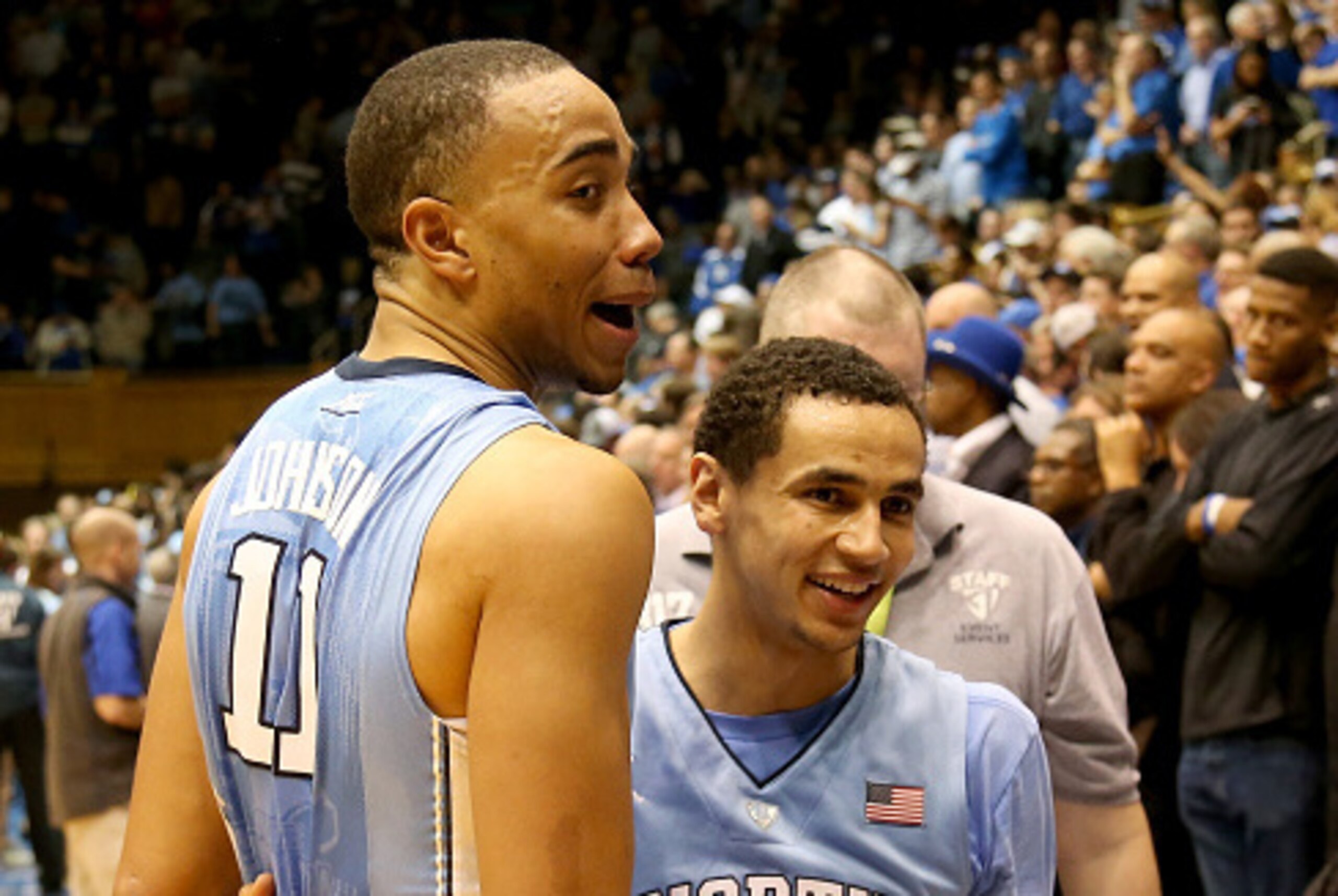 DURHAM, NC - MARCH 05:  Teammates Brice Johnson #11 and Marcus Paige #5 of the North Carolina Tar Heels celebrate after defeating the Duke Blue Devils 76-72 after their game at Cameron Indoor Stadium on March 5, 2016 in Durham, North Carolina.  (Photo by 