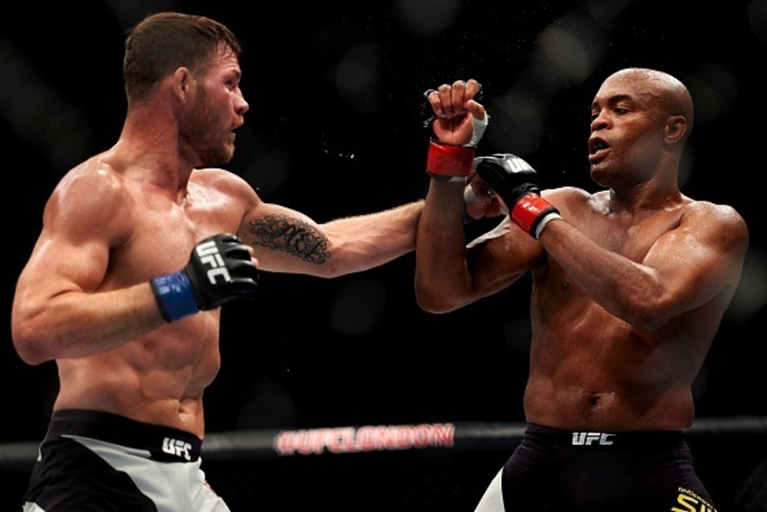 British fighter Michael Bisping (L) competes with Anderson Silva of Brazil (R) during their middleweight bout at the Ultimate Fighting Championship (UFC) Fight Night event in London on February 27, 2016.
Bisping beat Silva on a judge's decision over five British fighter Michael Bisping (L) competes with Anderson Silva of Brazil (R) during their middleweight bout at the Ultimate Fighting Championship (UFC) Fight Night event in London on February 27, 2016.
Bisping beat Silva on a judge's decision over five