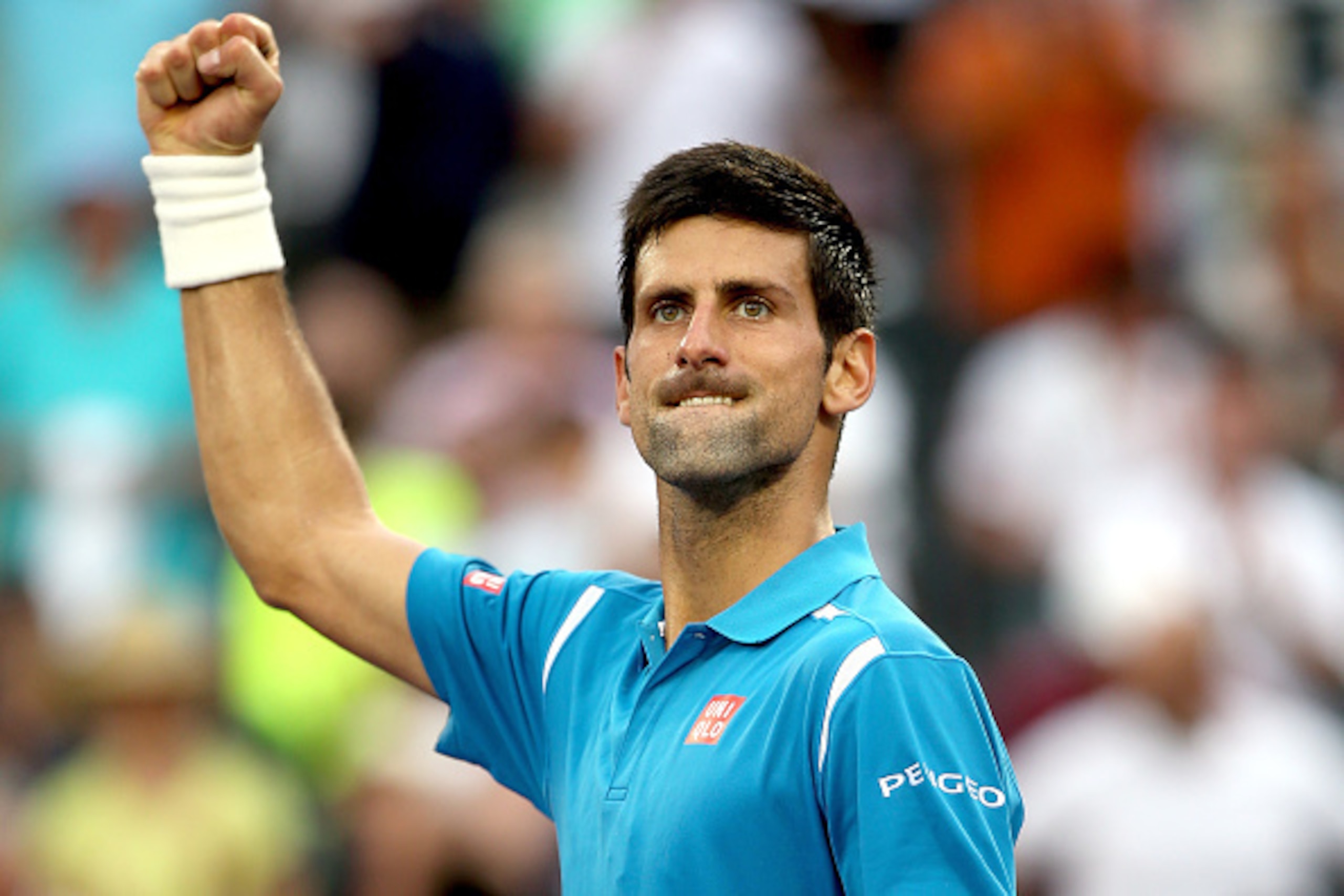KEY BISCAYNE, FL - MARCH 29:  Novak Djokovic of Serbia celebrates his win over Dominic Thiem of Austria during the Miami Open presented by Itau at Crandon Park Tennis Center on March 29, 2016 in Key Biscayne, Florida.  (Photo by Matthew Stockman/Getty Ima