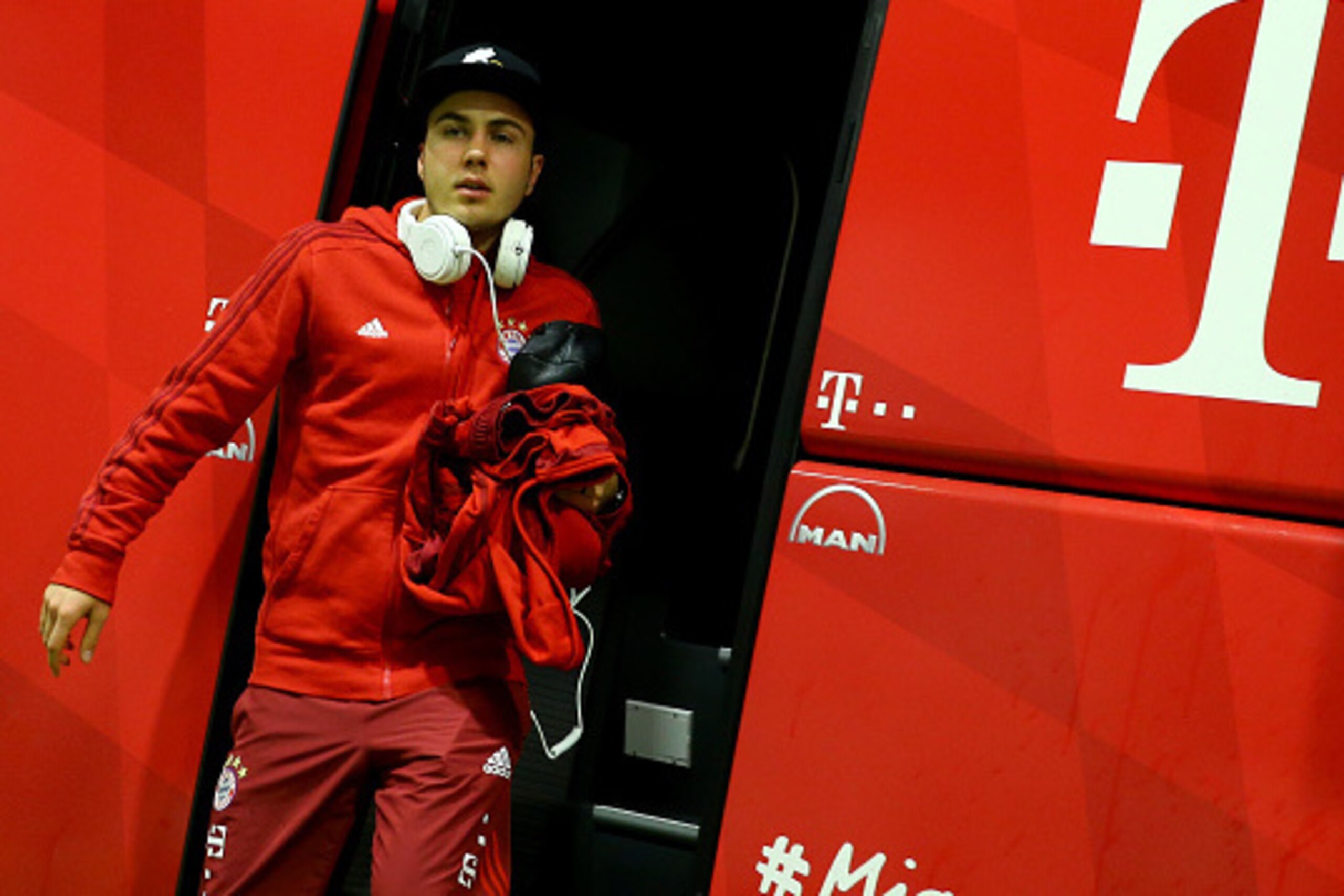 DORTMUND, GERMANY - MARCH 05: Mari Goetze of Bayern walks out of the bus prior to the Bundesliga match between Borussia Dortmund and FC Bayern Muenchen at Signal Iduna Park on March 5, 2016 in Dortmund, Germany. (Photo by Christof Koepsel/Getty Images DORTMUND, GERMANY - MARCH 05: Mari Goetze of Bayern walks out of the bus prior to the Bundesliga match between Borussia Dortmund and FC Bayern Muenchen at Signal Iduna Park on March 5, 2016 in Dortmund, Germany. (Photo by Christof Koepsel/Getty Images