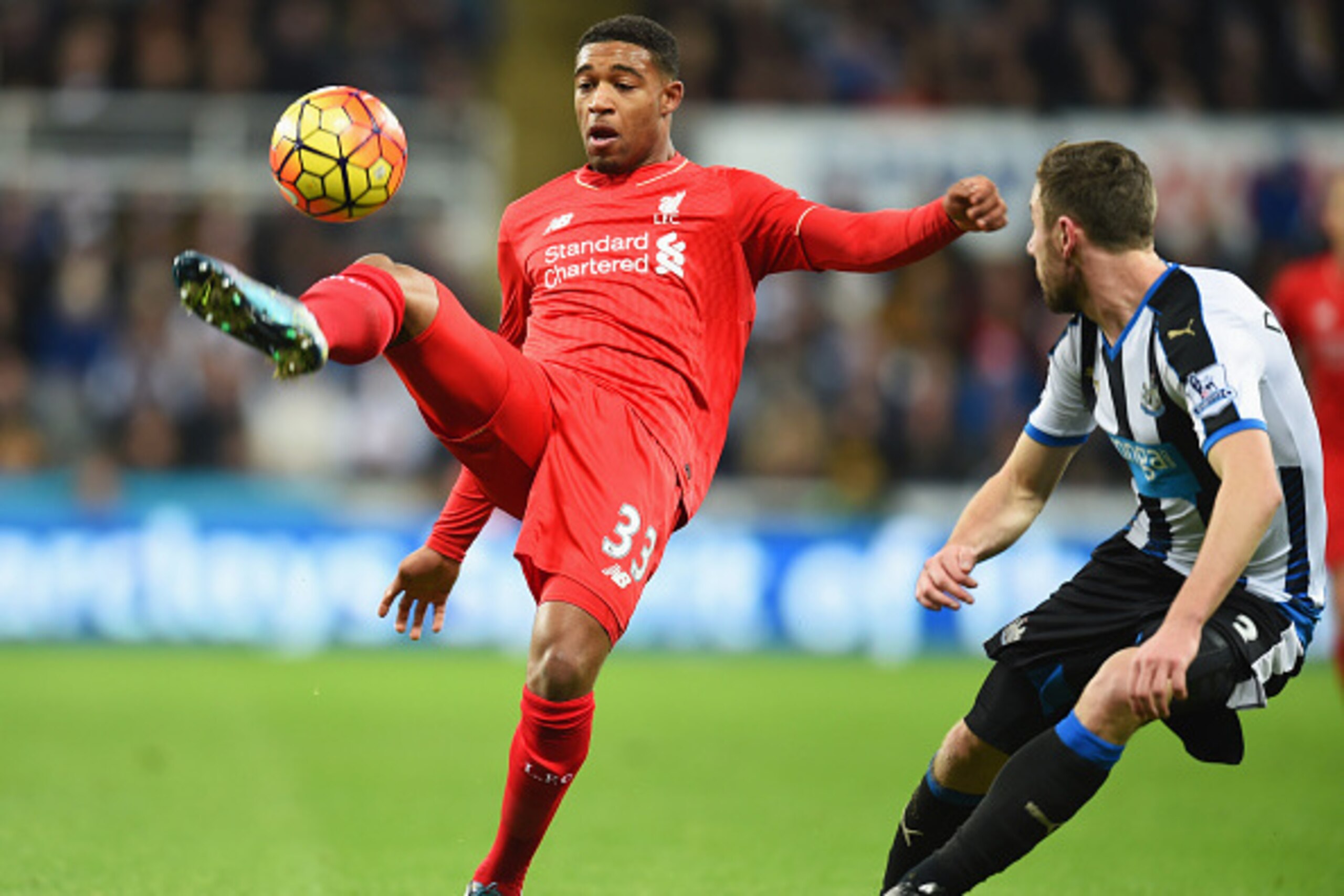NEWCASTLE UPON TYNE, ENGLAND - DECEMBER 06: Jordon Ibe of Liverpool takes on Paul Dummett of Newcastle United during the Barclays Premier League match between Newcastle United and Liverpool at St James' Park on December 6, 2015 in Newcastle upon Tyne, En NEWCASTLE UPON TYNE, ENGLAND - DECEMBER 06: Jordon Ibe of Liverpool takes on Paul Dummett of Newcastle United during the Barclays Premier League match between Newcastle United and Liverpool at St James' Park on December 6, 2015 in Newcastle upon Tyne, En