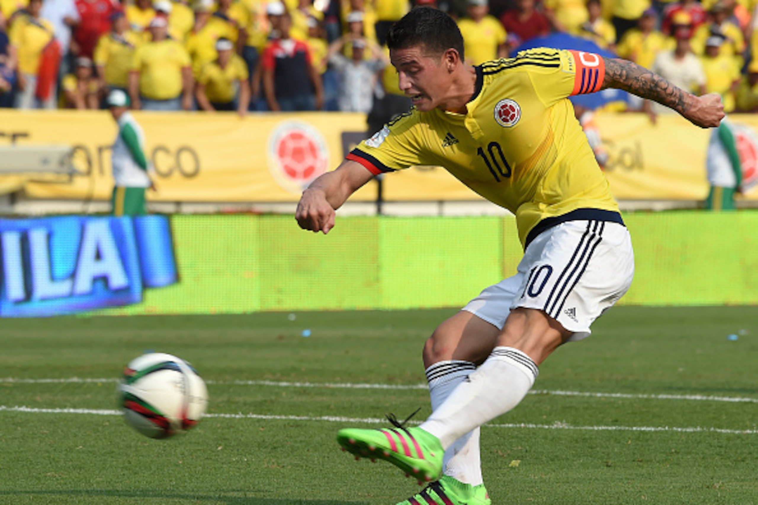 Colombia's James Rodriguez shoots during their Russia 2018 FIFA World Cup South American Qualifiers' football match in Barranquilla, Colombia, on March 29, 2016. AFP PHOTO / LUIS ACOSTA / AFP / LUIS ACOSTA (Photo credit should read LUIS ACOSTA/AFP/ Colombia's James Rodriguez shoots during their Russia 2018 FIFA World Cup South American Qualifiers' football match in Barranquilla, Colombia, on March 29, 2016. AFP PHOTO / LUIS ACOSTA / AFP / LUIS ACOSTA (Photo credit should read LUIS ACOSTA/AFP/