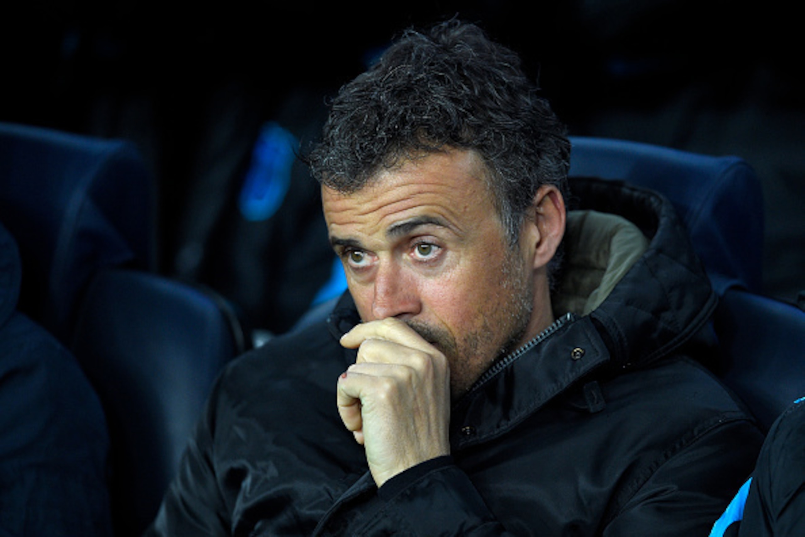 Barcelona's coach Luis Enrique looks on before the UEFA Champions League Round of 16 second leg football match FC Barcelona vs Arsenal FC at the Camp Nou stadium in Barcelona on March 16, 2016.  / AFP / LLUIS GENE        (Photo credit should read LLUIS GE