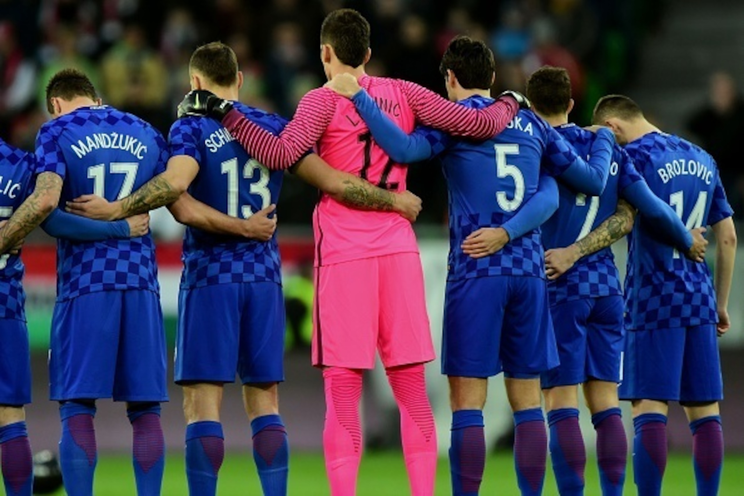 Croatian players (L to R) Mario Manduki?, Gordon Schildenfeld, goalkeeper Lovre Kalinic, Vedran ?orluka, ime Vrsaljko and Marcelo Brozovi? observe a minute of silence for the victims of the Brussels attack ahead the friendly football match Hungary v Croat