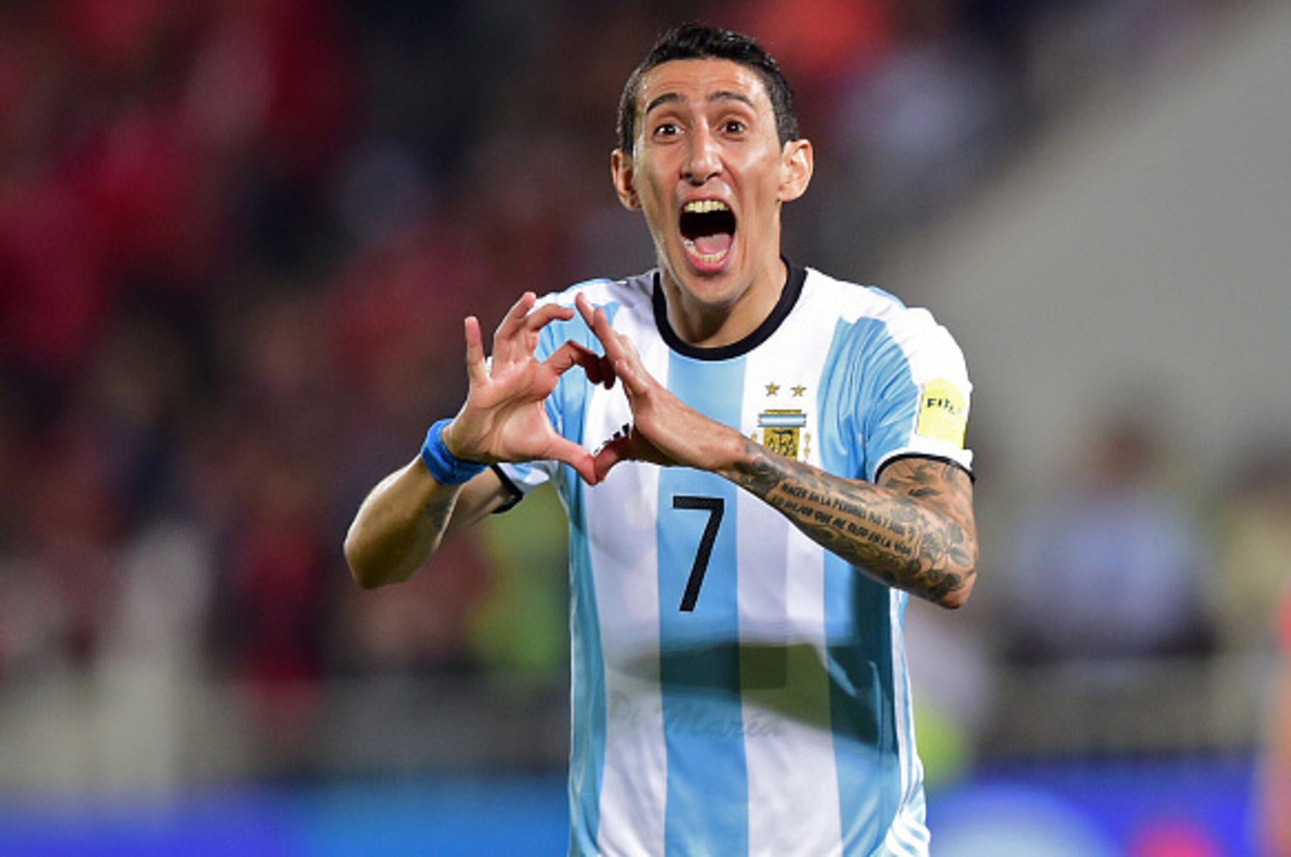 Argentina's Angel Di Maria celebrates after scoring against Chile during their Russia 2018 FIFA World Cup South American Qualifiers' football match, in Santiago on March 24, 2016.   AFP PHOTO / MARTIN BERNETTI / AFP / MARTIN BERNETTI        (Photo credit 