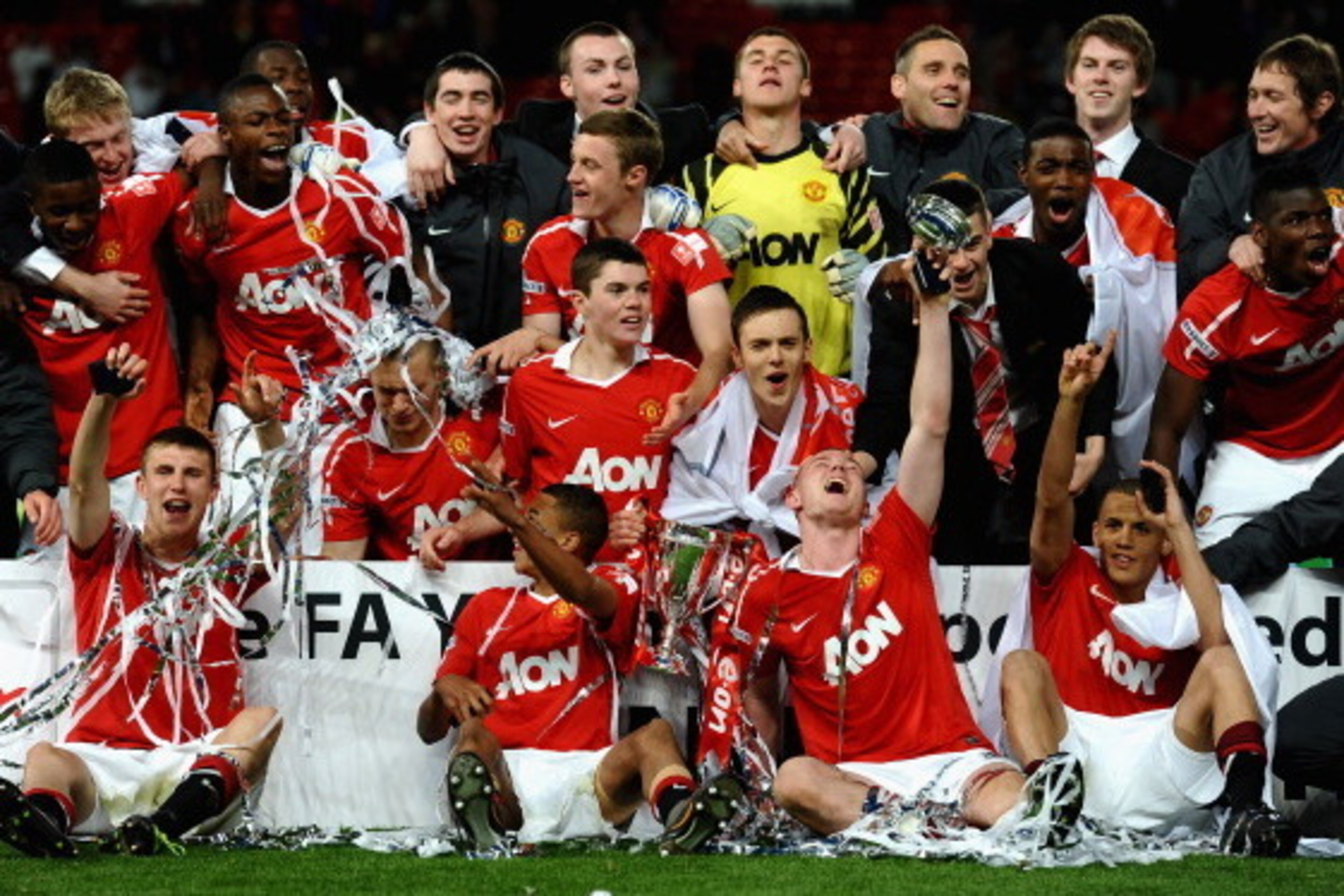 MANCHESTER, ENGLAND - MAY 23:  The Manchester United Team celebrate victory in the FA Youth Cup Final 2nd Leg match between Manchester United and Sheffield United at Old Trafford on May 23, 2011 in Manchester, England.  (Photo by Laurence Griffiths/Getty 