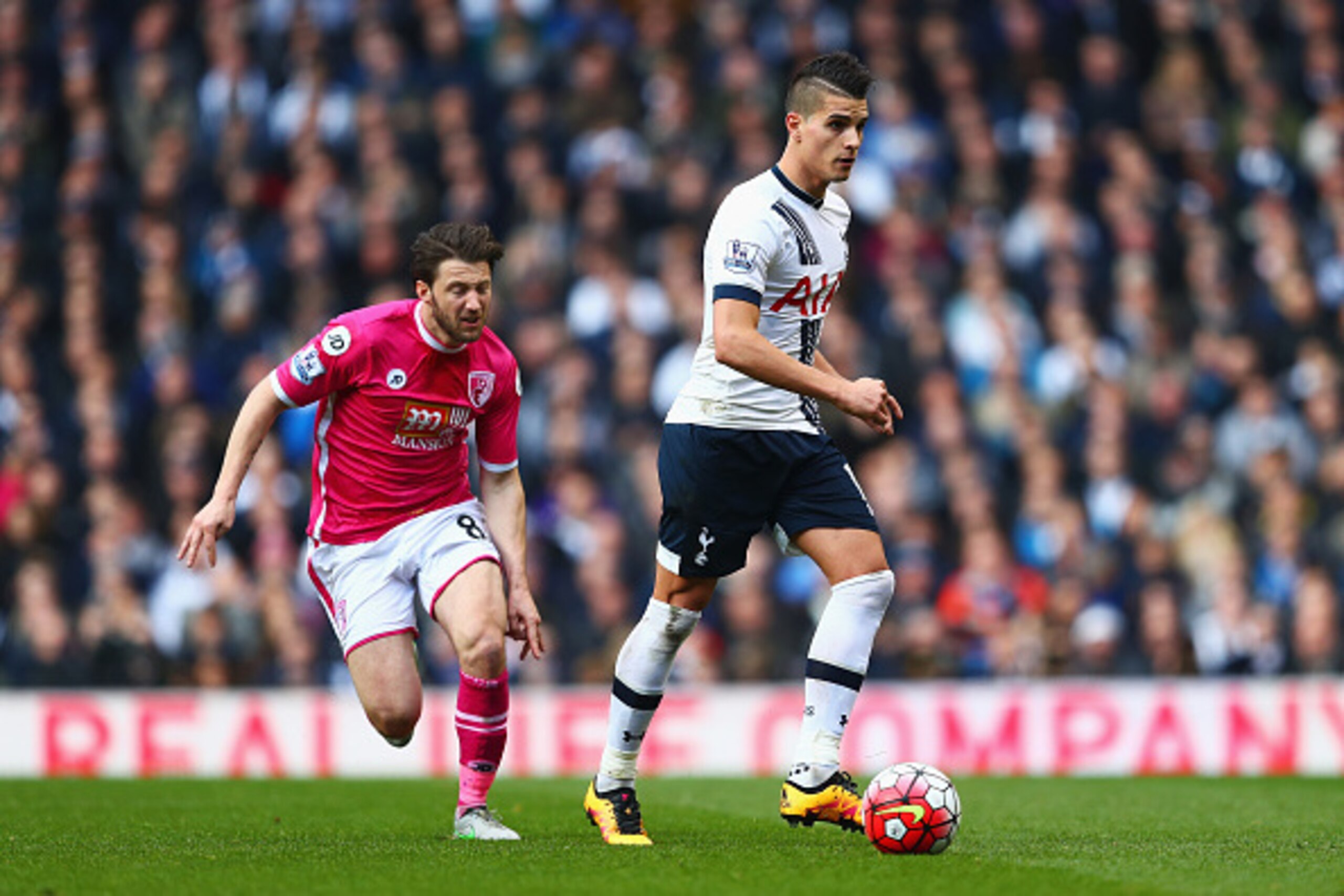 LONDON, ENGLAND - MARCH 20: Erik Lamela of Tottenham Hotspur is watched by Harry Arter of Bournemouth during the Barclays Premier League match between Tottenham Hotspur and A.F.C. Bournemouth at White Hart Lane on March 20, 2016 in London, United Kingdom LONDON, ENGLAND - MARCH 20: Erik Lamela of Tottenham Hotspur is watched by Harry Arter of Bournemouth during the Barclays Premier League match between Tottenham Hotspur and A.F.C. Bournemouth at White Hart Lane on March 20, 2016 in London, United Kingdom